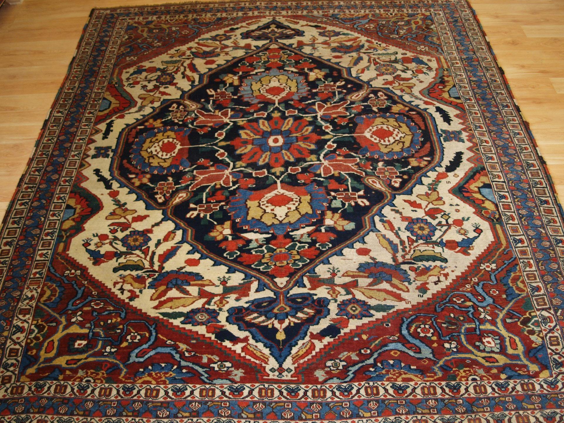 
Size: 6ft 7in x 5ft 11in (200 x 180cm).

Antique Khamseh tribal rug of beautiful design and colour.

Circa 1870.

A scarce example of one of the most beautiful of all nomadic tribal designs woven by the Khamseh tribe. A few known rugs of this