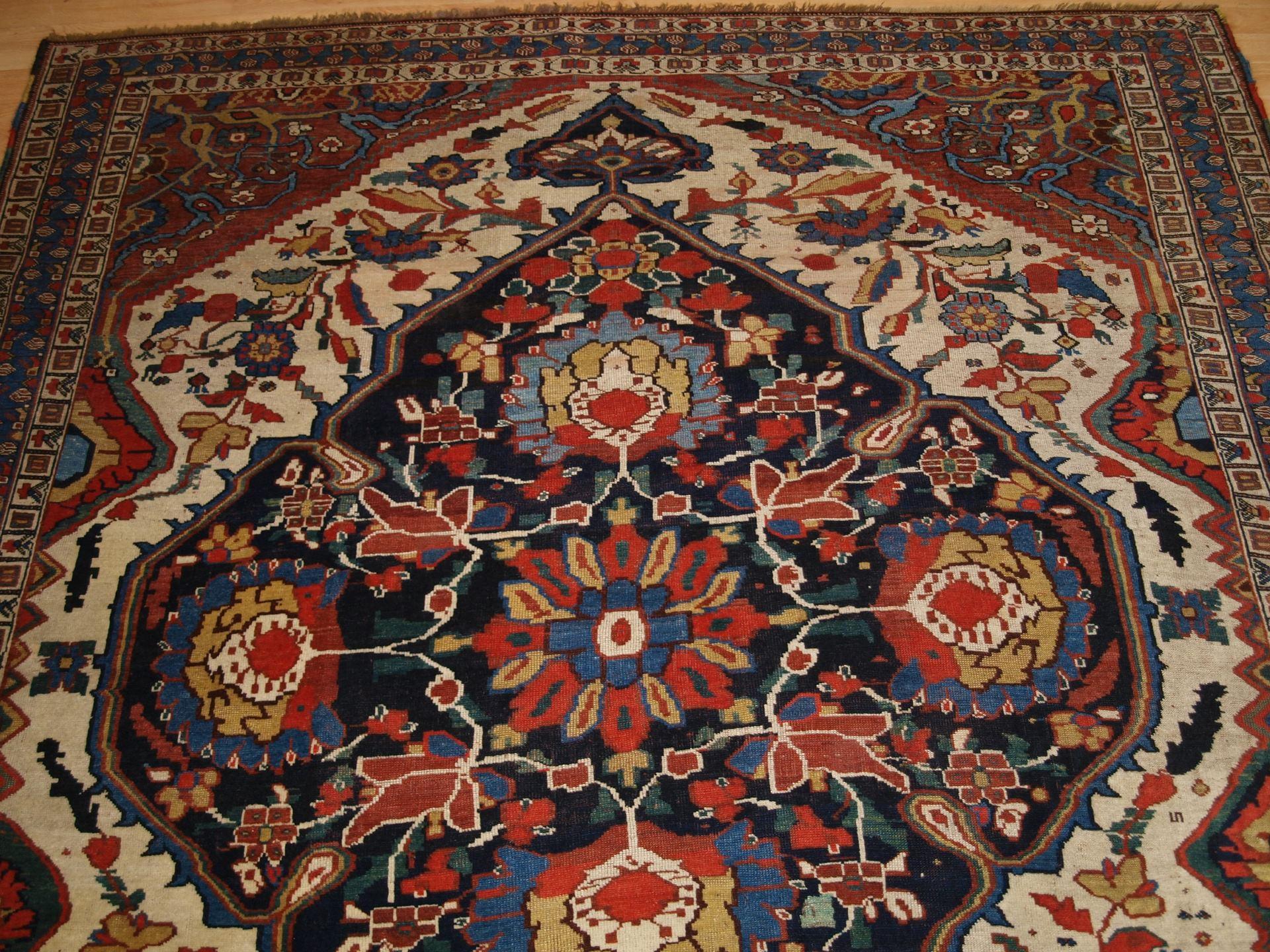 Wool Antique Khamseh tribal rug of beautiful design and colour.  Circa 1870. For Sale