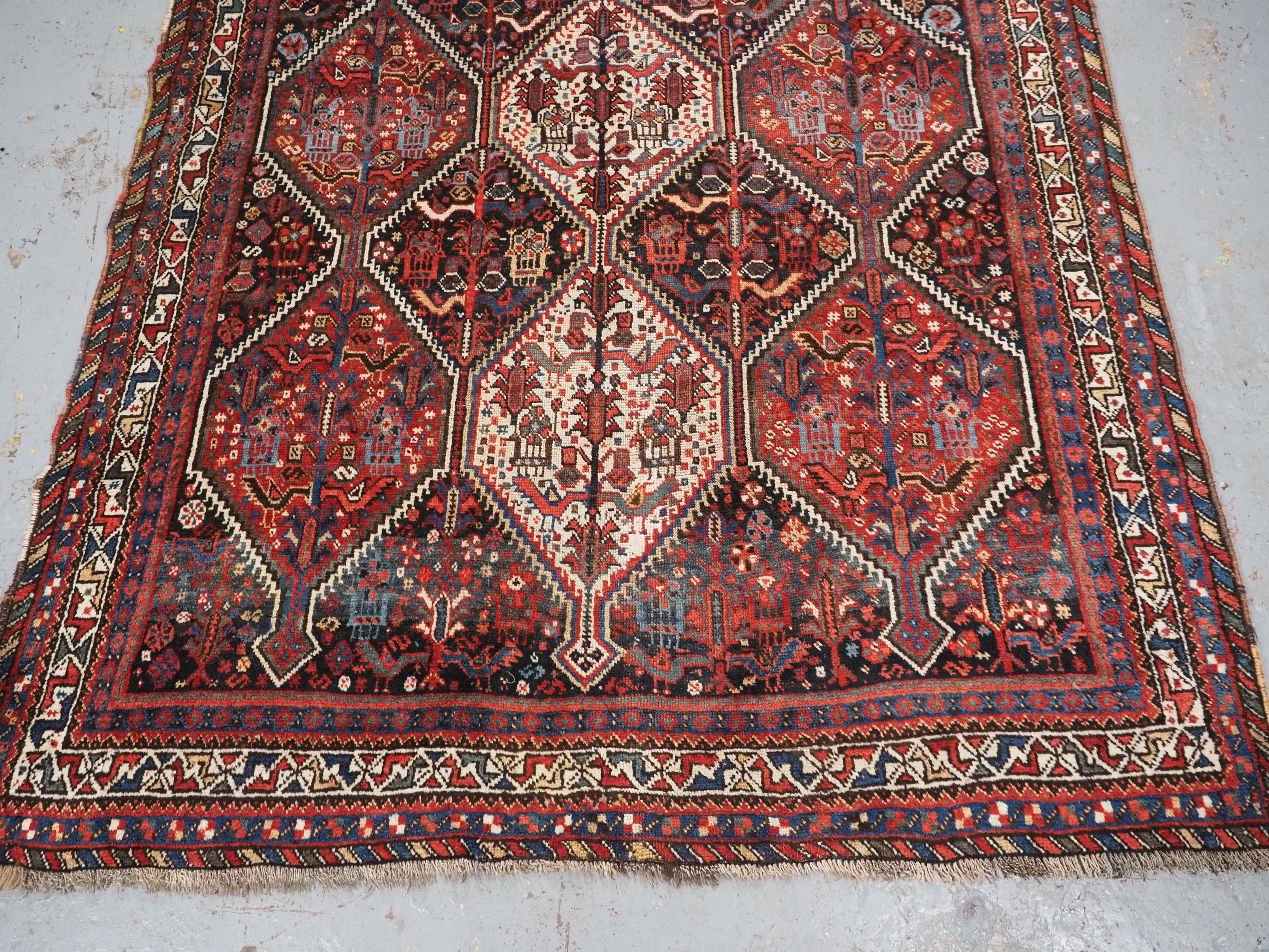 19th Century Antique  Khamseh tribal rug of bird medallion design.  Circa 1900. For Sale