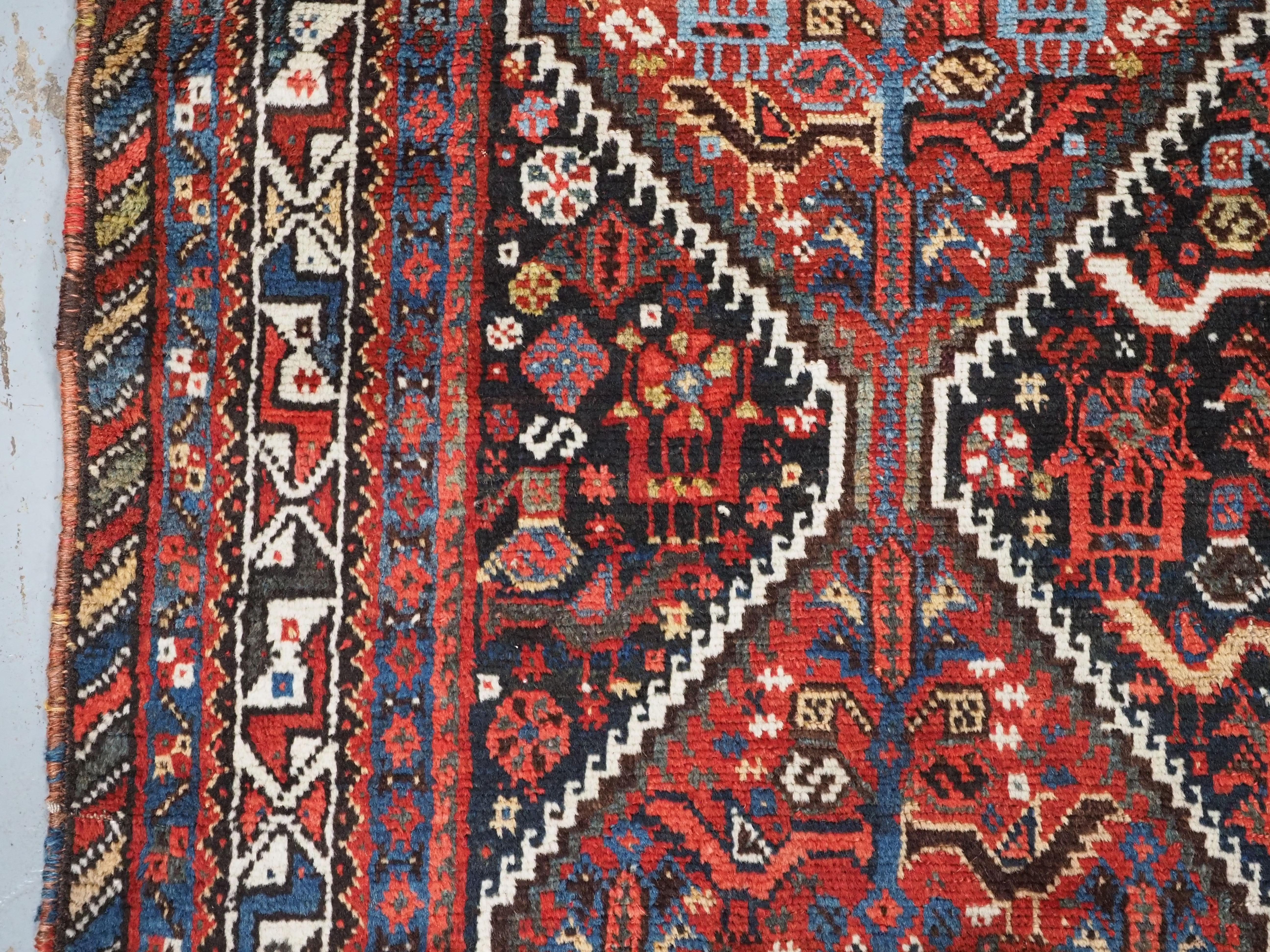 Antique  Khamseh tribal rug of bird medallion design.  Circa 1900. For Sale 1
