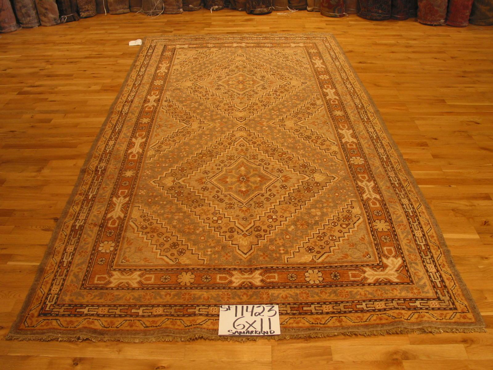 Hand-Knotted Antique Khotan Area Rug For Sale