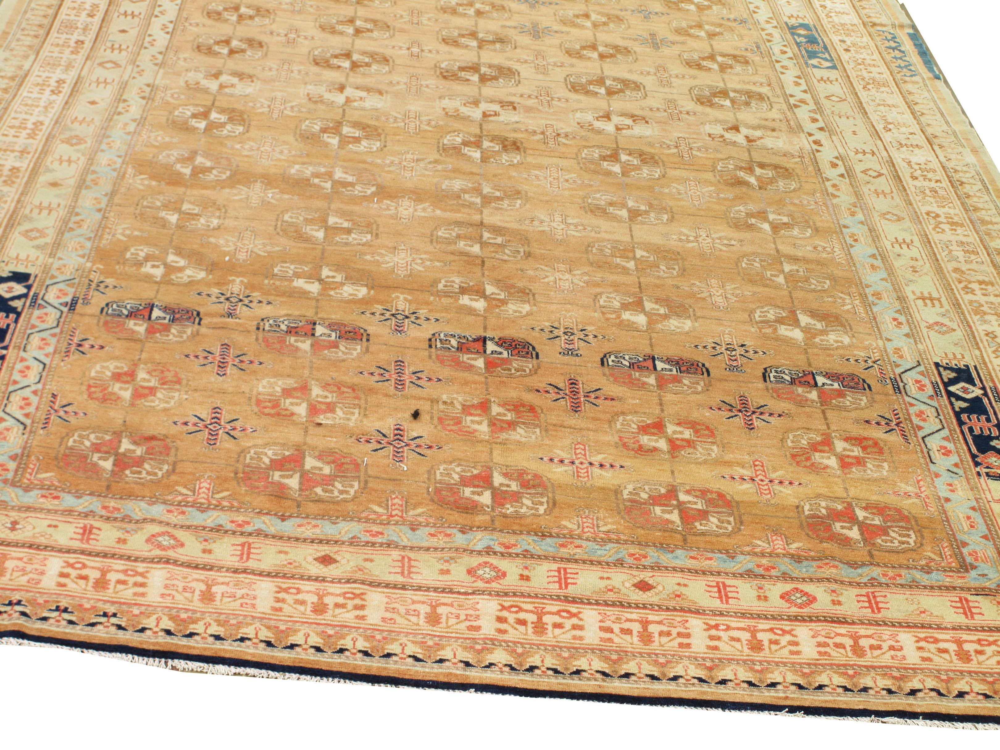 Antique Khotan/Samarkand from Uzbekistan, Samarkand was once the gateway to China, circa 1900. This rug has an Abrash which is a natural change in color that occurs when different dyes are used in a batch of wool and gives uniqueness an extra beauty