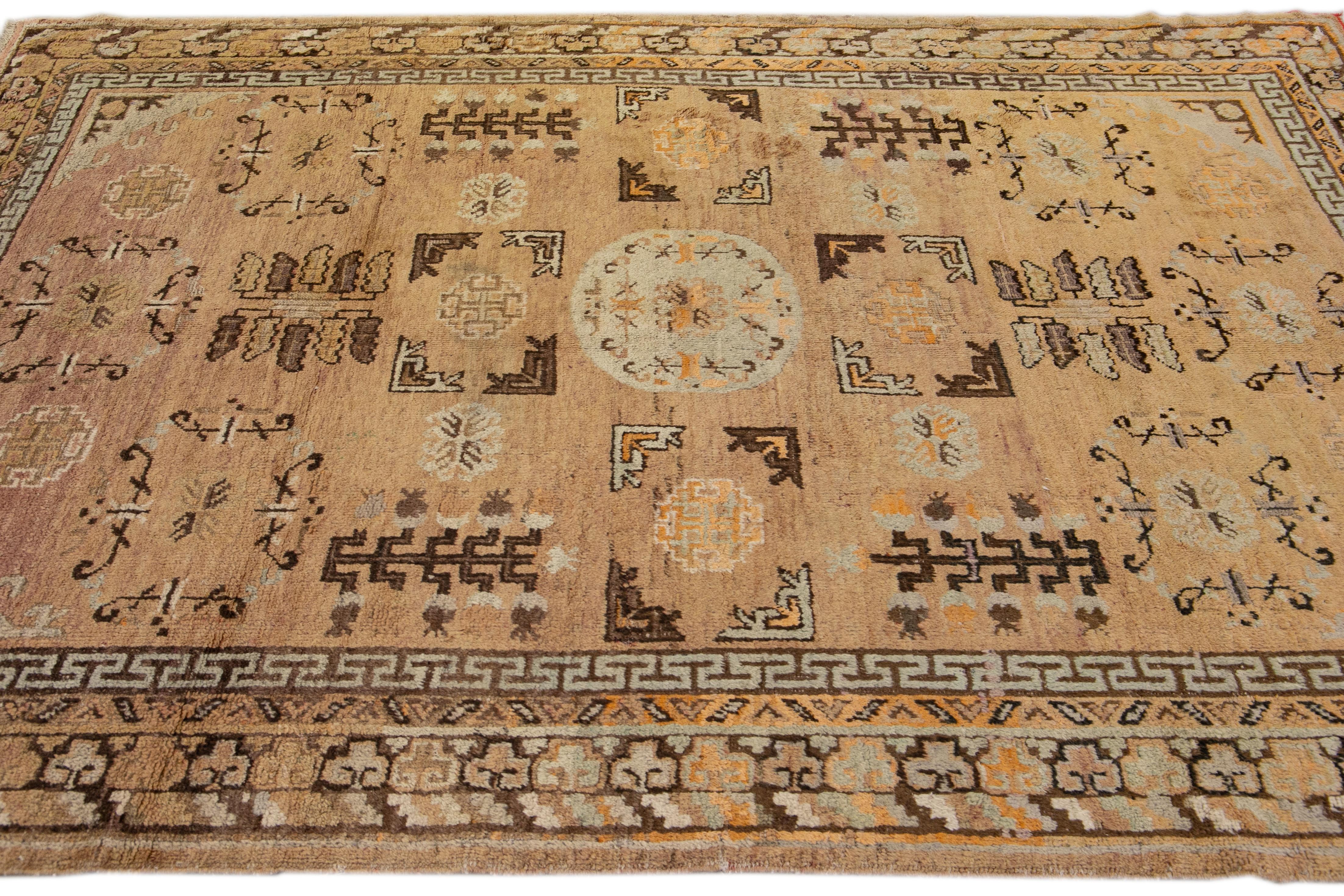 Early 20th Century Antique Khotan Handmade Geometric Tan Wool Rug
