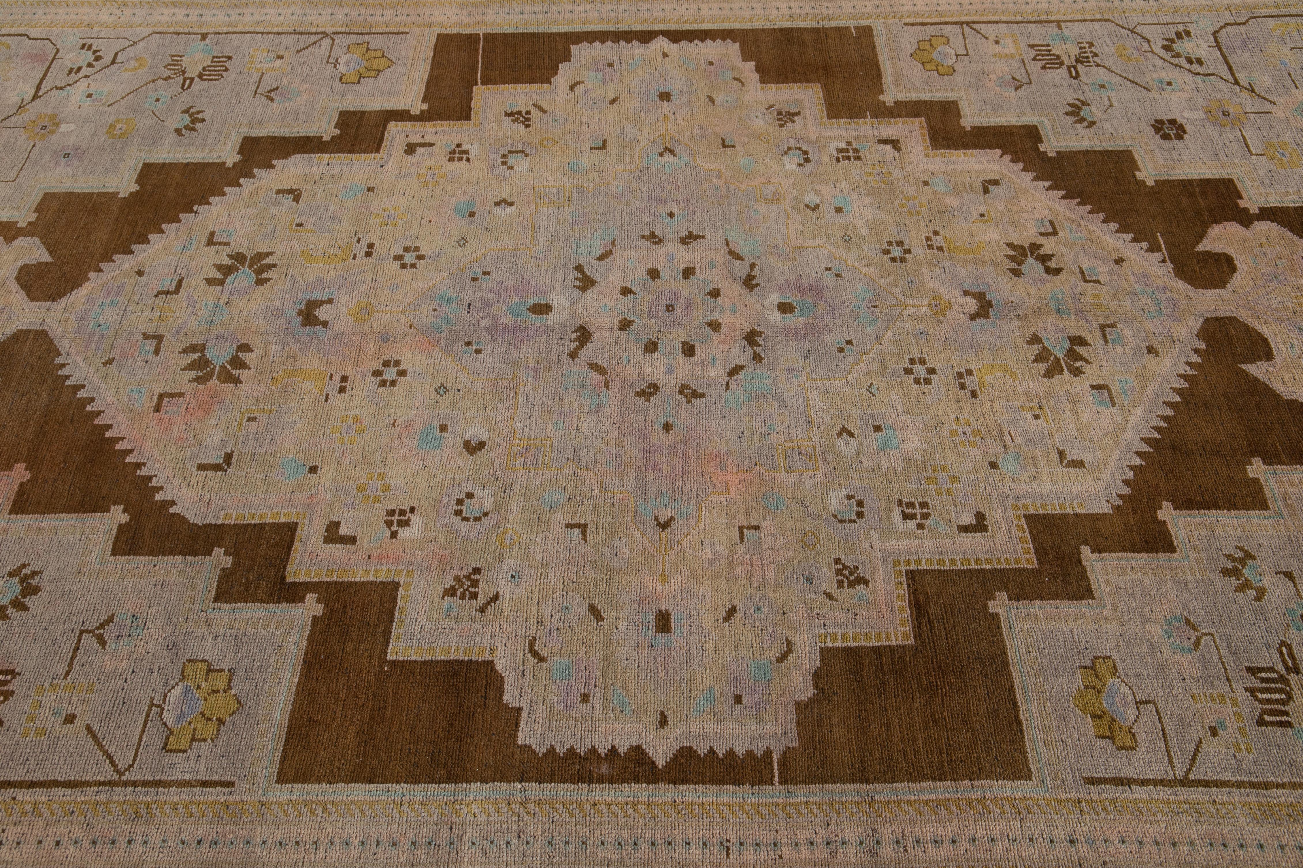 Antique Khotan Handmade Medallion Floral Motif Tan Room Size Wool Rug In Good Condition For Sale In Norwalk, CT