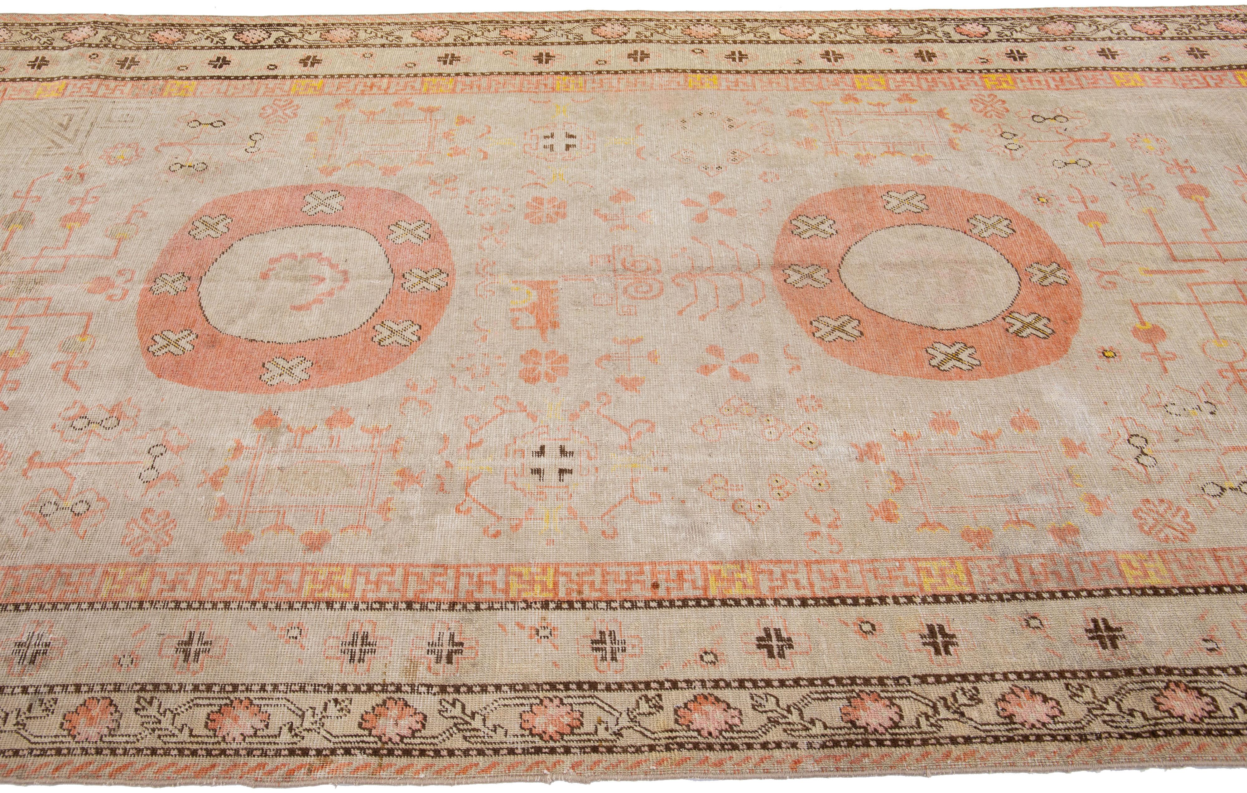 Antique Khotan Handmade Peach Persian Wool Rug With Allover Design In Good Condition For Sale In Norwalk, CT