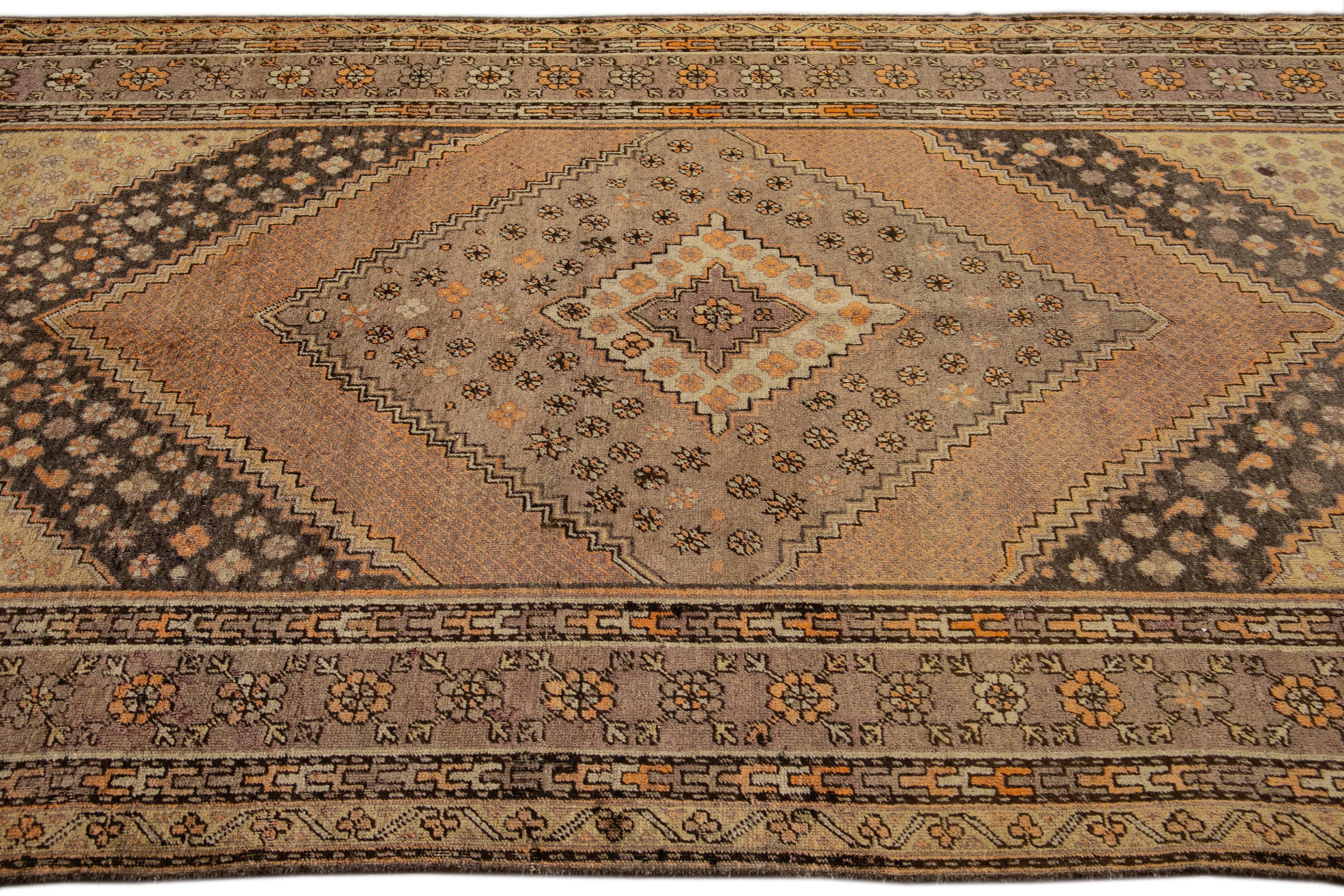 Early 20th Century Antique Khotan Handmade Tan Medallion Wool Rug For Sale