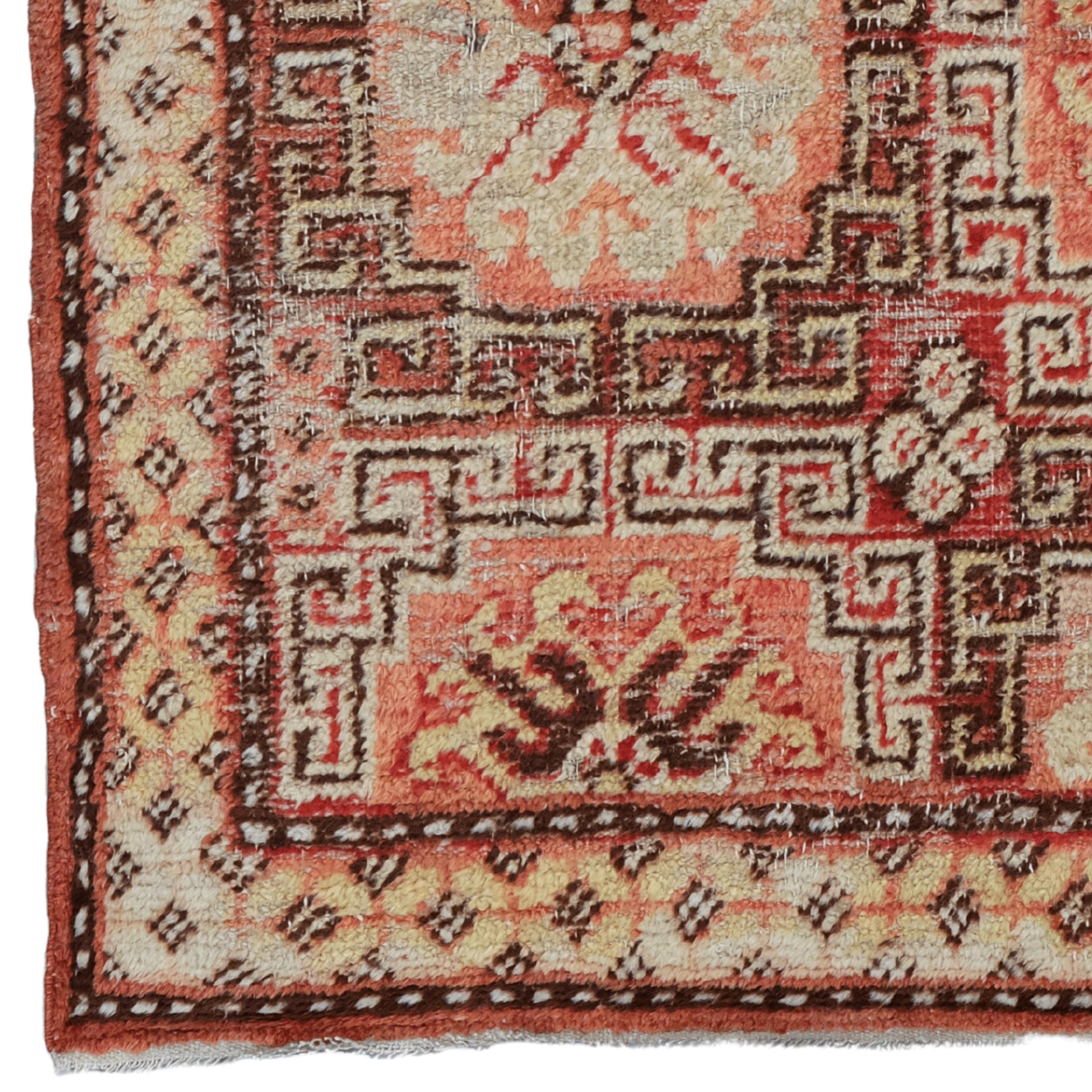 19th Century Khotan Rug - Handwoven Turkish Rug

This elegant 19th-century Khotan rug adds nobility to any space with its historical texture and sophisticated design. This handmade work, measuring 77x97 cm, has been designed to maintain its