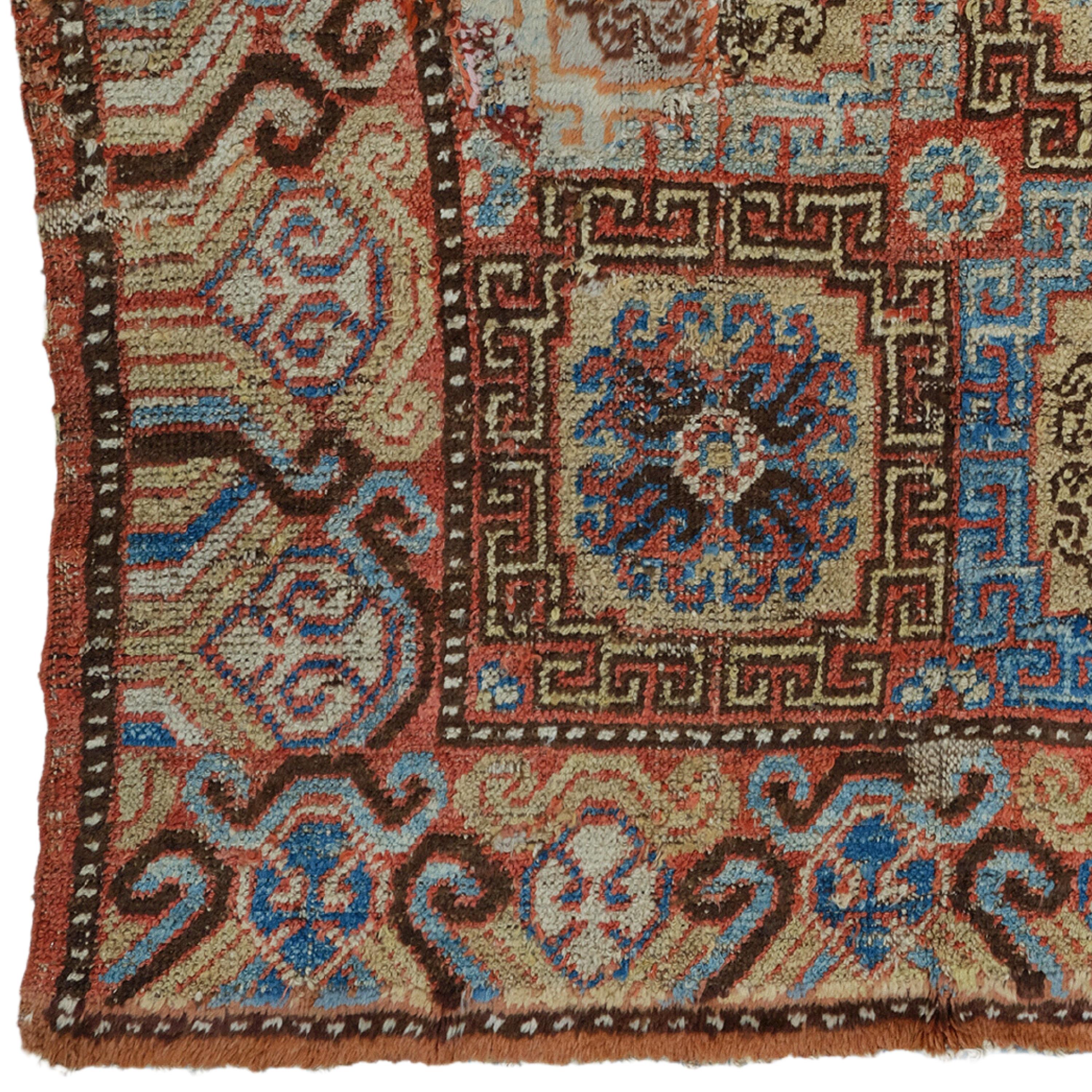 19th Century Khotan Rug - Handwoven Rug

This elegant 19th-century Khotan rug adds nobility to any space with its historical richness and sophisticated design. This handmade work, measuring 150x238 cm, dazzles with its carefully woven details and