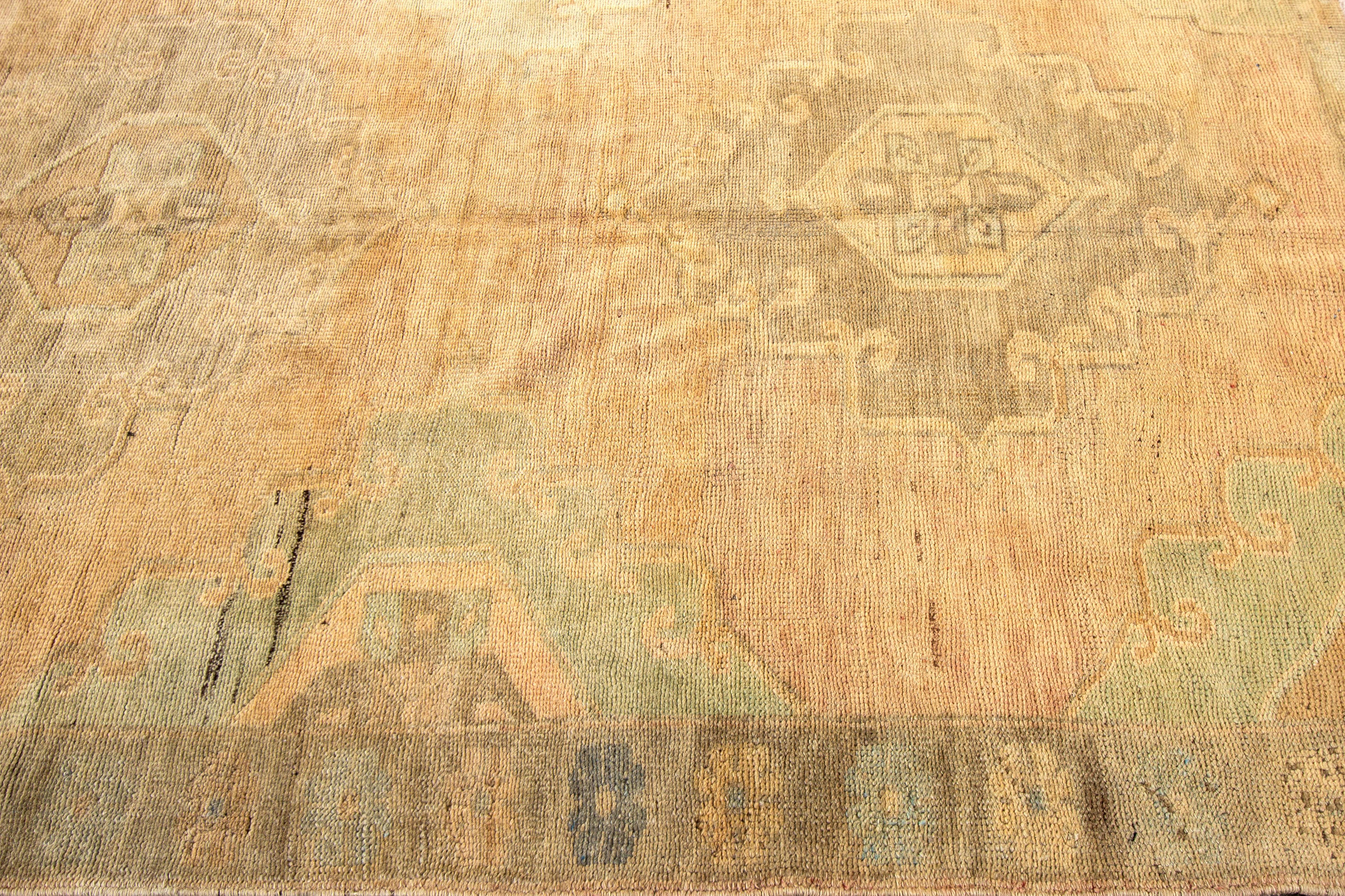 Noué à la main Tapis Khotan antique fait main en laine couleur pêche en vente