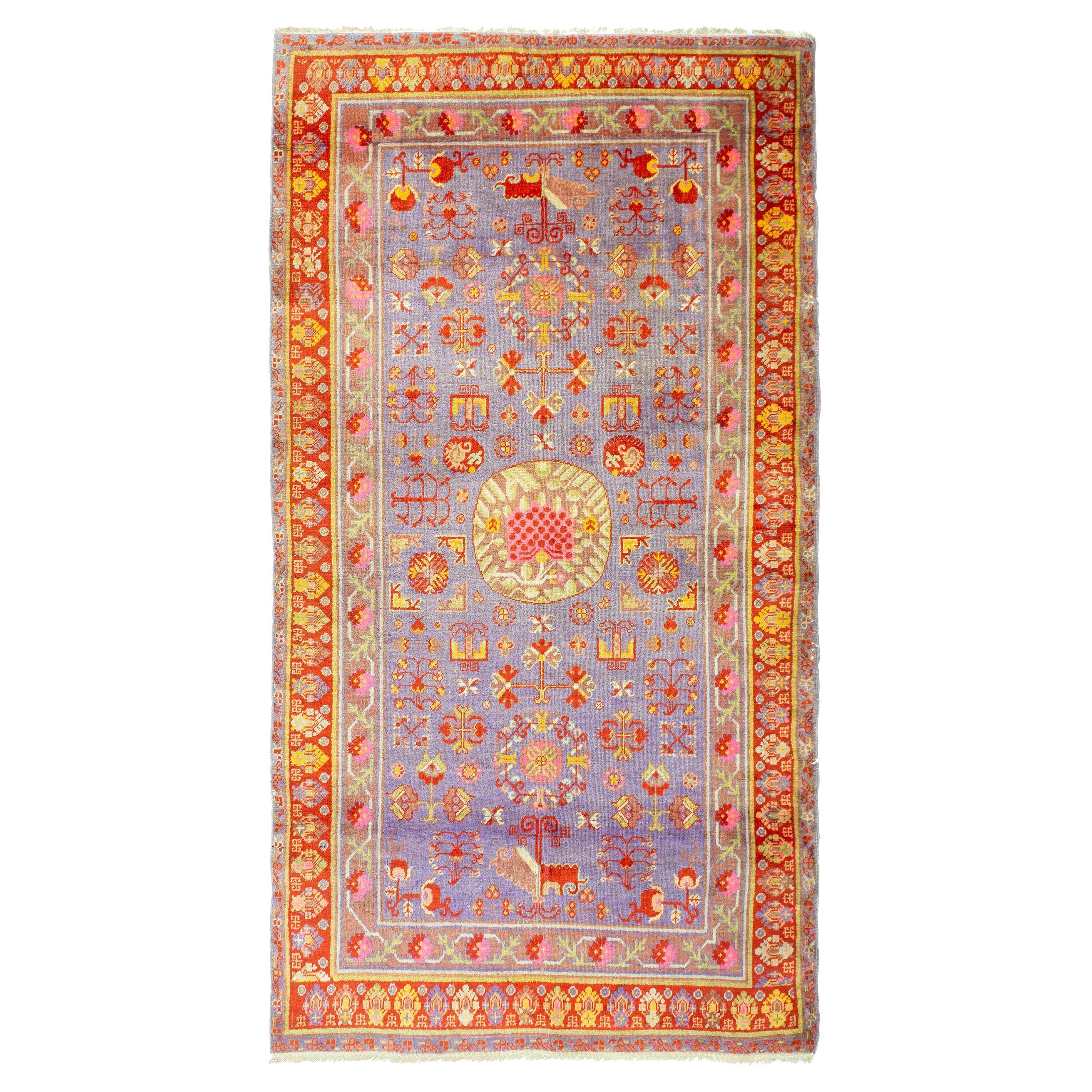 Antique Khotan Rug, Hand Woven, Plum Field with Medallion, East Turkestan, 1930 For Sale