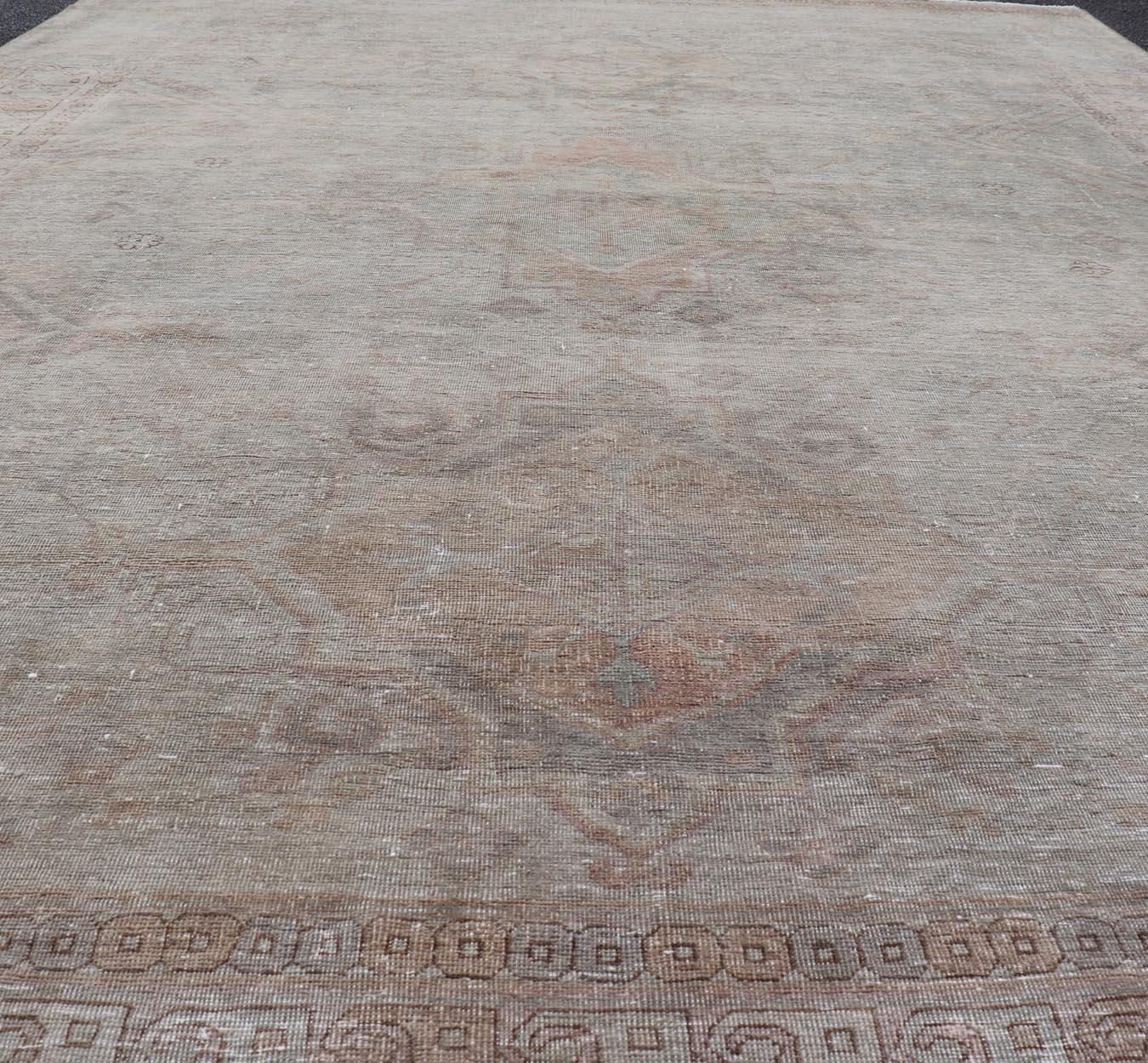 Turkestan Antique Khotan Rug in Medallions with Silvery Background and Muted Colors  For Sale