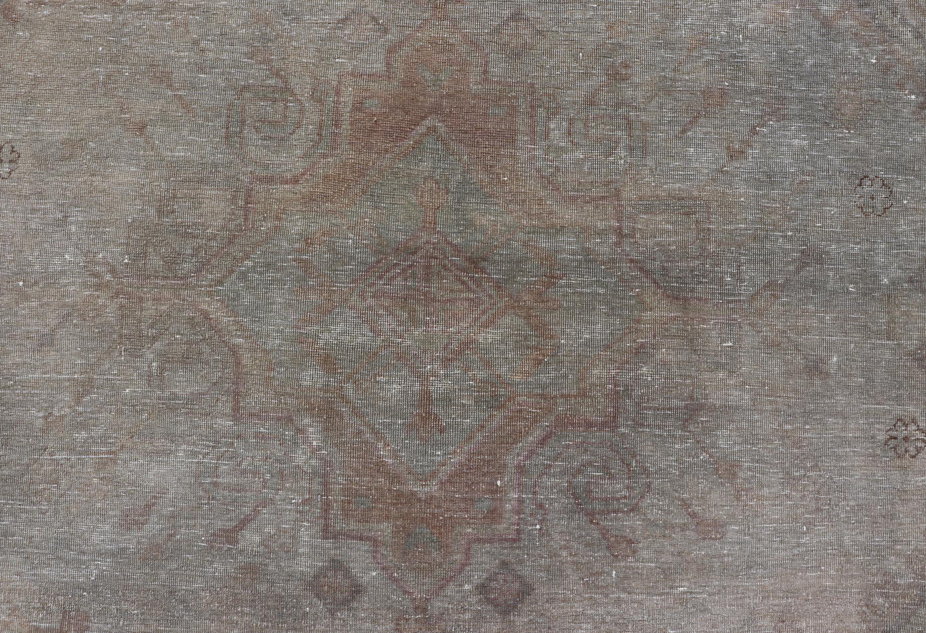 Hand-Knotted Antique Khotan Rug in Medallions with Silvery Background and Muted Colors  For Sale
