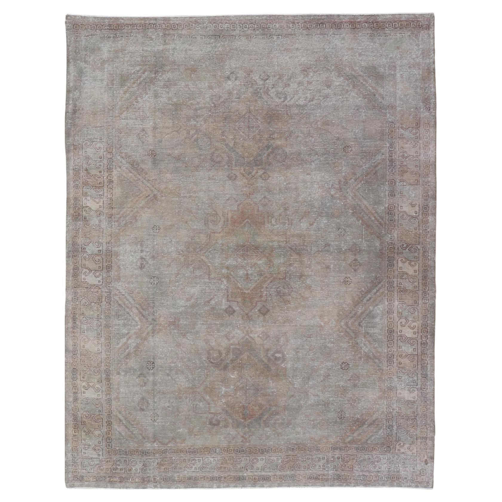Antique Khotan Rug in Medallions with Silvery Background and Muted Colors 