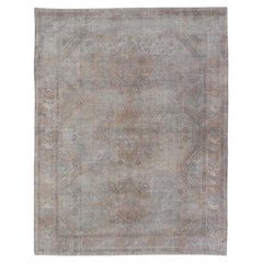 Antique Khotan Rug in Medallions with Silvery Background and Muted Colors 
