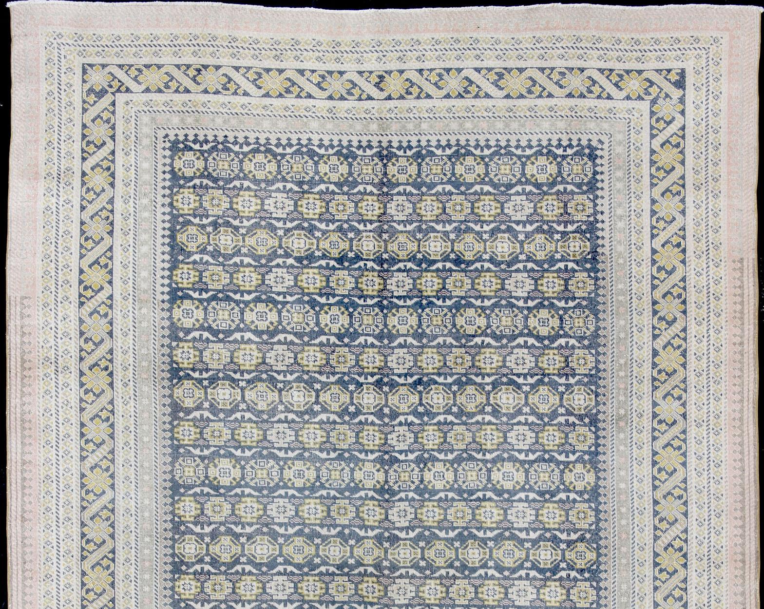 Turkish Antique Khotan Rug in Shades of Blue with Gray, L. Pink and Yellow Accents For Sale