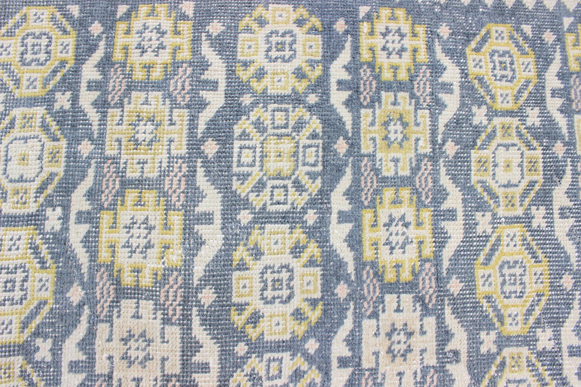 Antique Khotan Rug in Shades of Blue with Gray, L. Pink and Yellow Accents For Sale 1