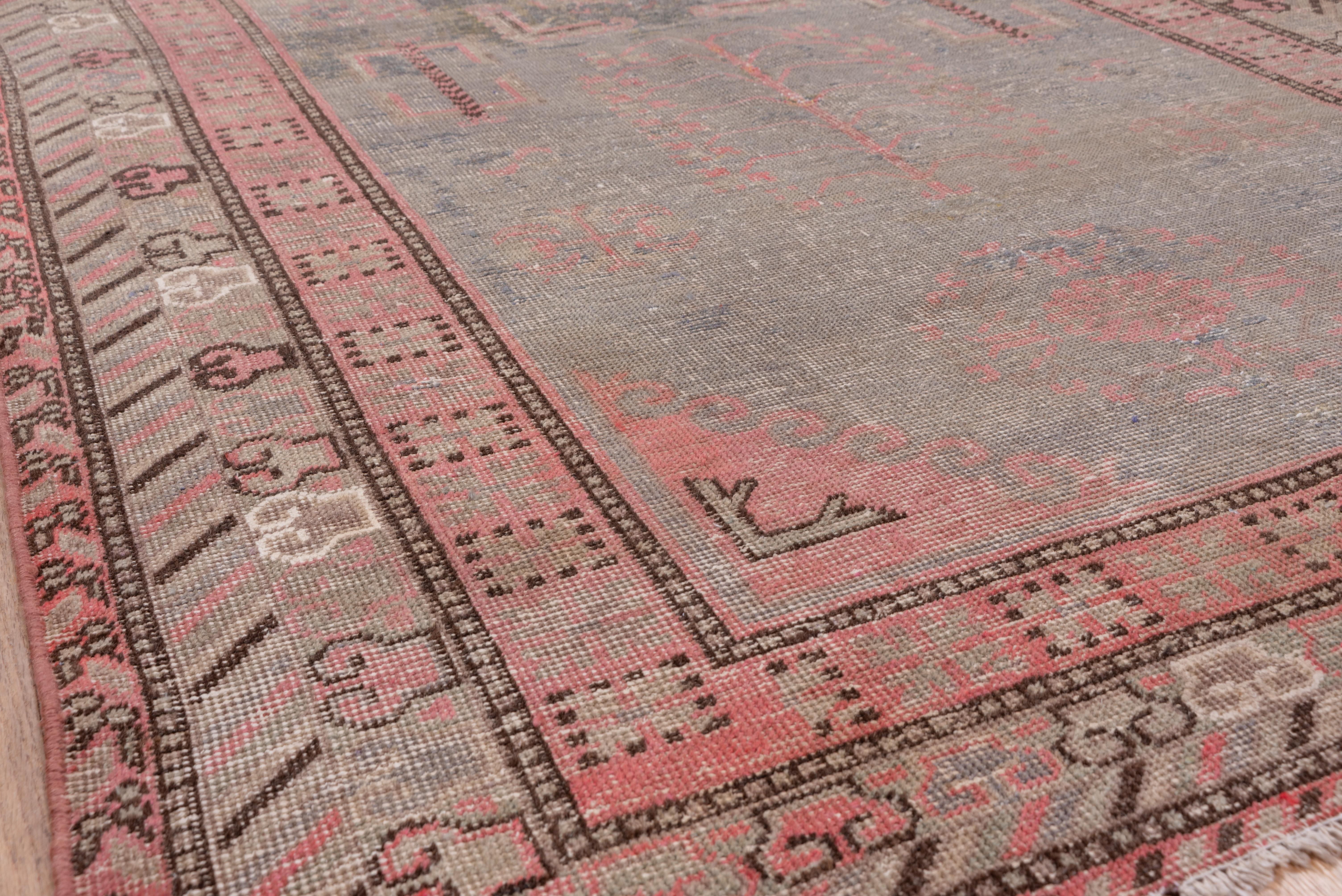 East Turkestani Antique Khotan Rug, Light Gray Field, Pink Borders, Lighly Distressed For Sale