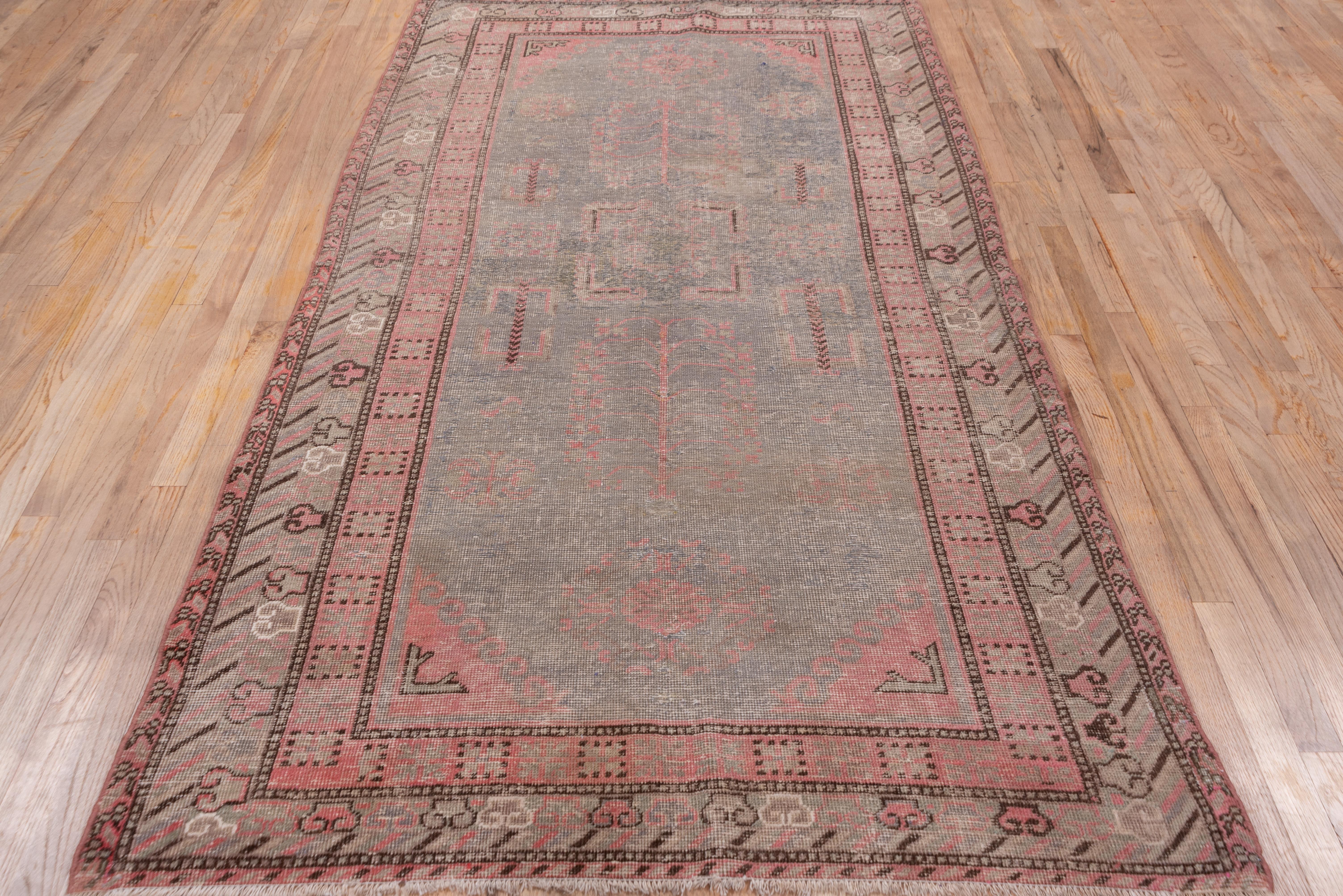 Hand-Knotted Antique Khotan Rug, Light Gray Field, Pink Borders, Lighly Distressed For Sale