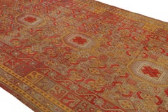 Antique Khotan Rug Medallion Style Red Blue and Gold Pattern by Rug & Kilim