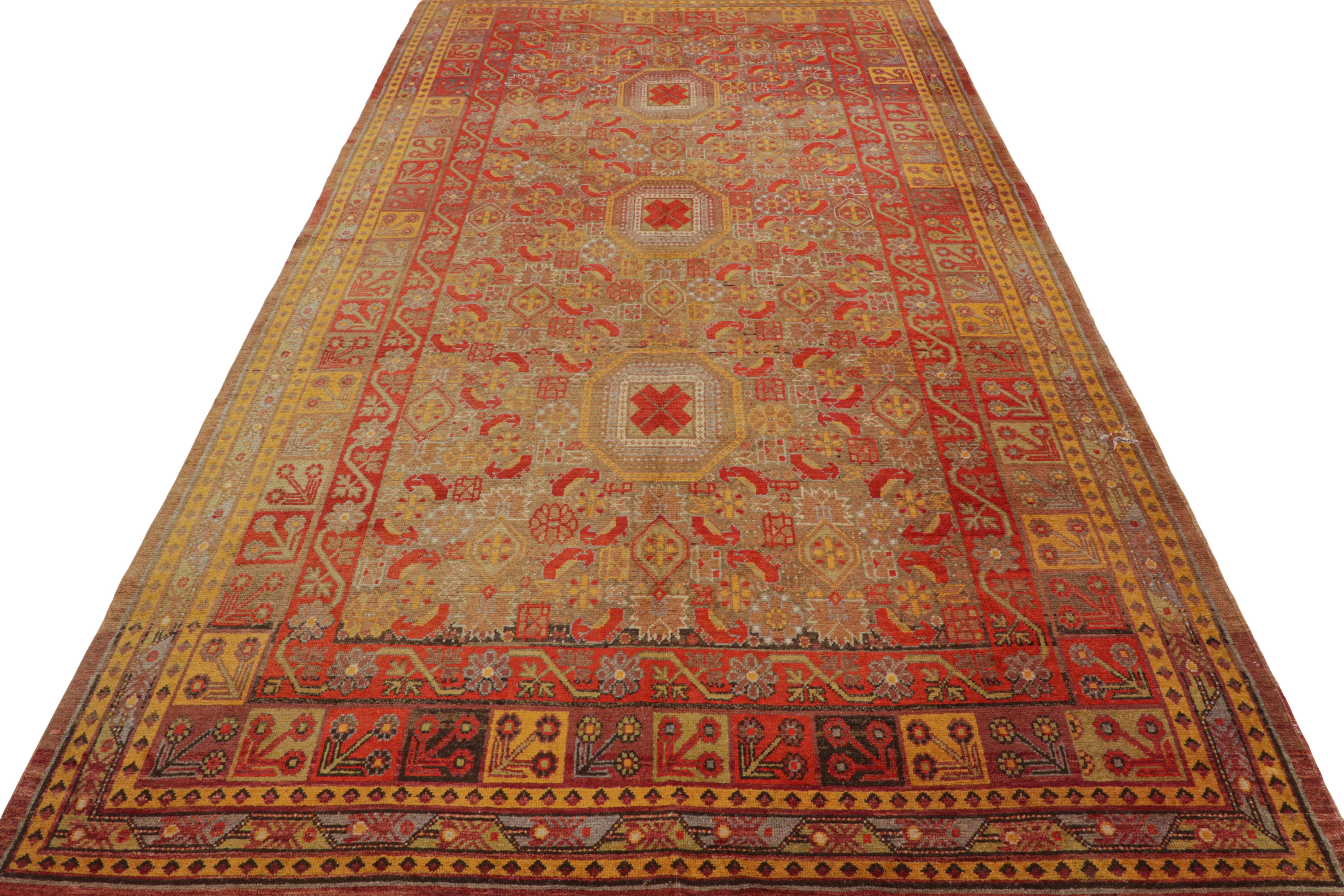 Antique Khotan Rug Medallion Style Red Blue and Gold Pattern by Rug & Kilim In Good Condition For Sale In Long Island City, NY