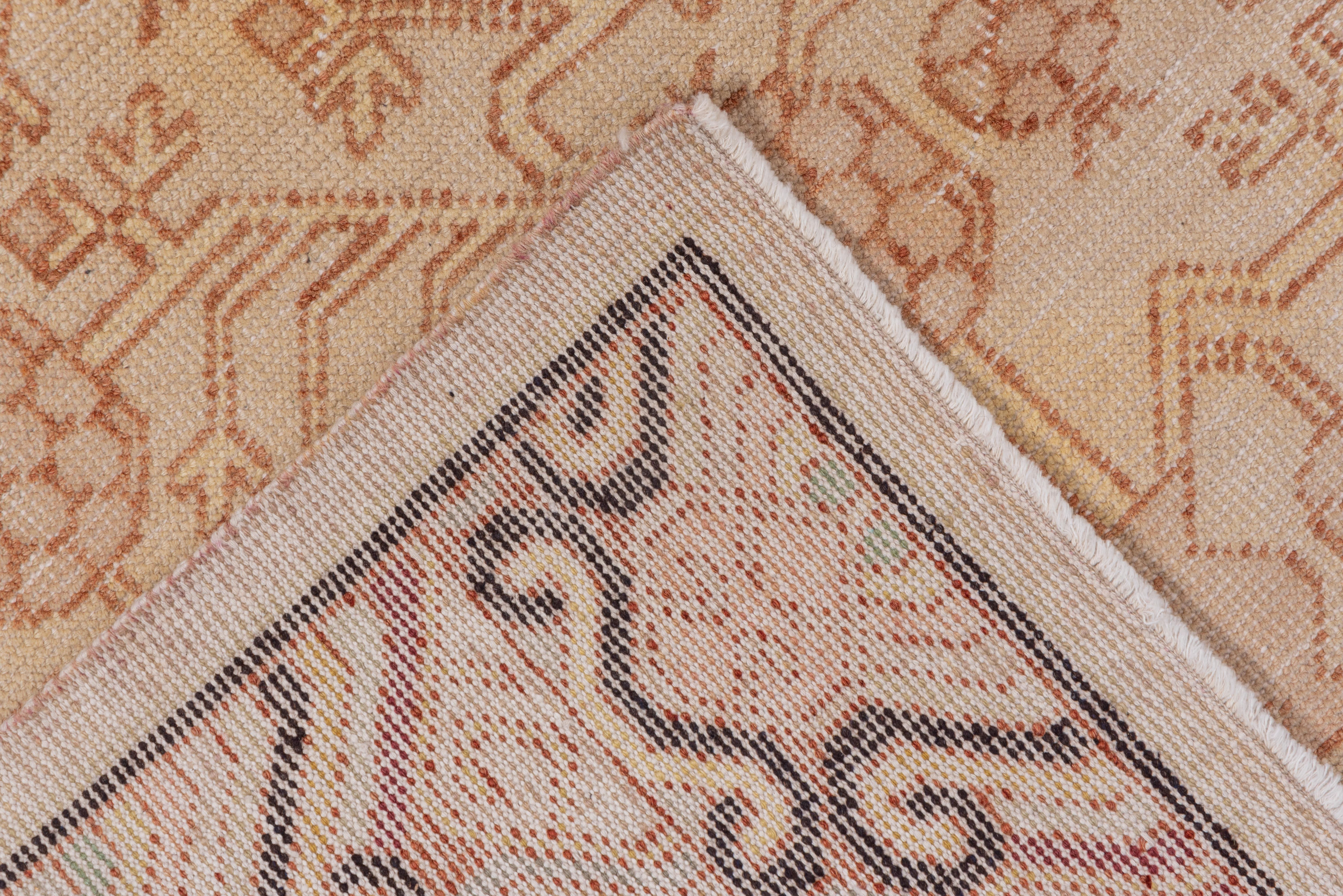 Antiker Khotan-Teppich, rosa Töne, neutrales Farbfeld, Granatapfel-Design (Wolle) im Angebot