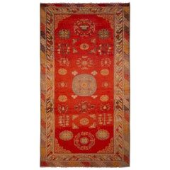 Antique Khotan Rug Red and Blue Medallion Pattern by Rug & Kilim