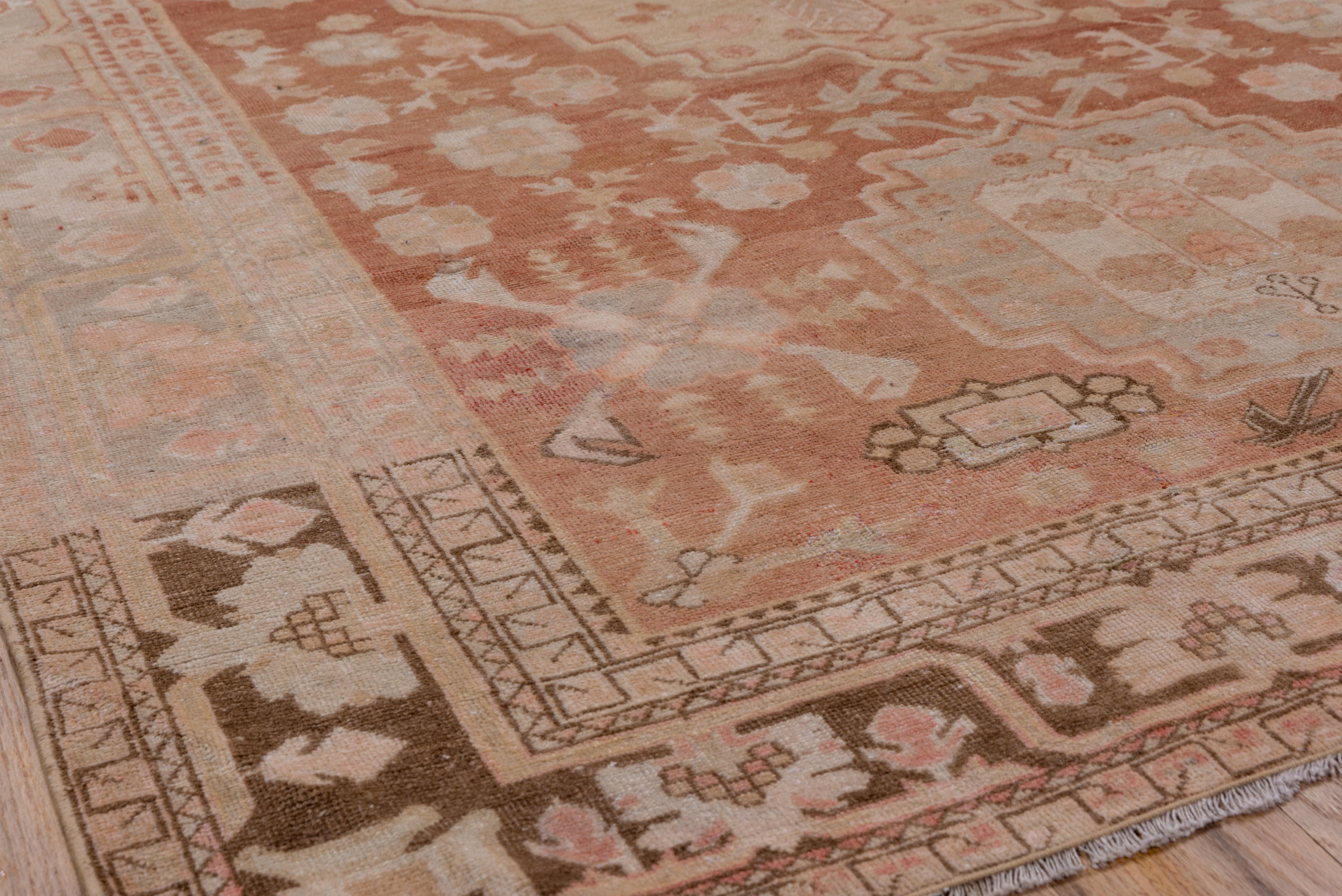 grey and terracotta rug