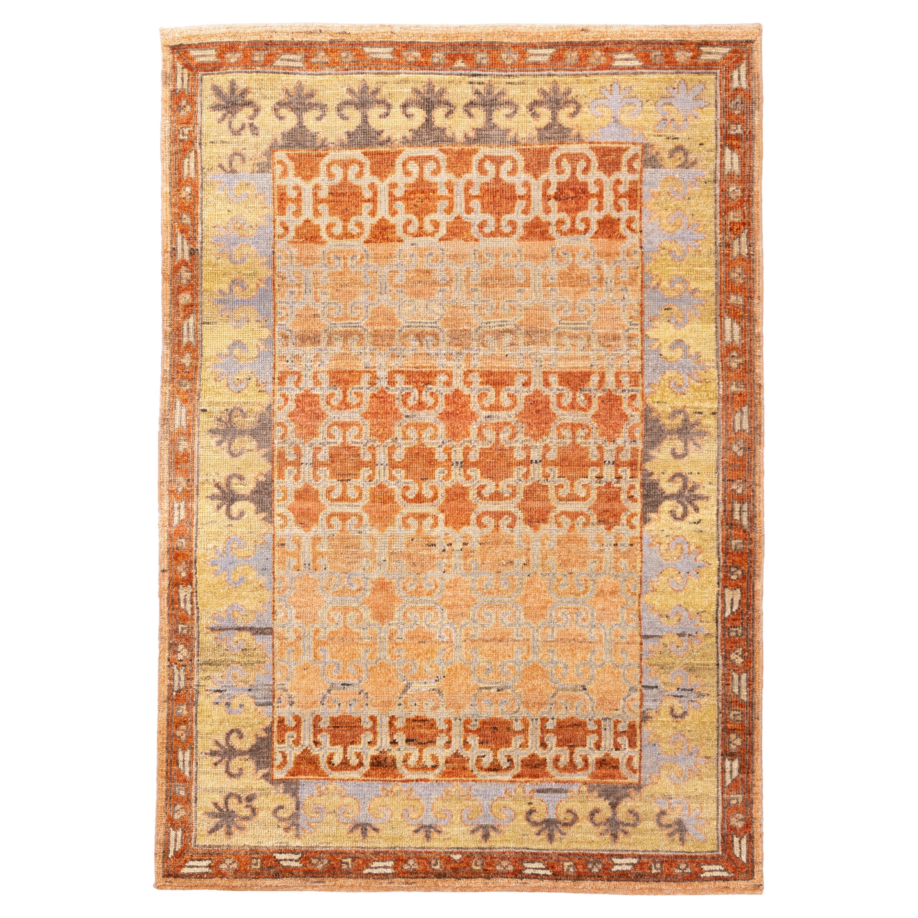 Tapis ancien de Khotan à motifs de treillis