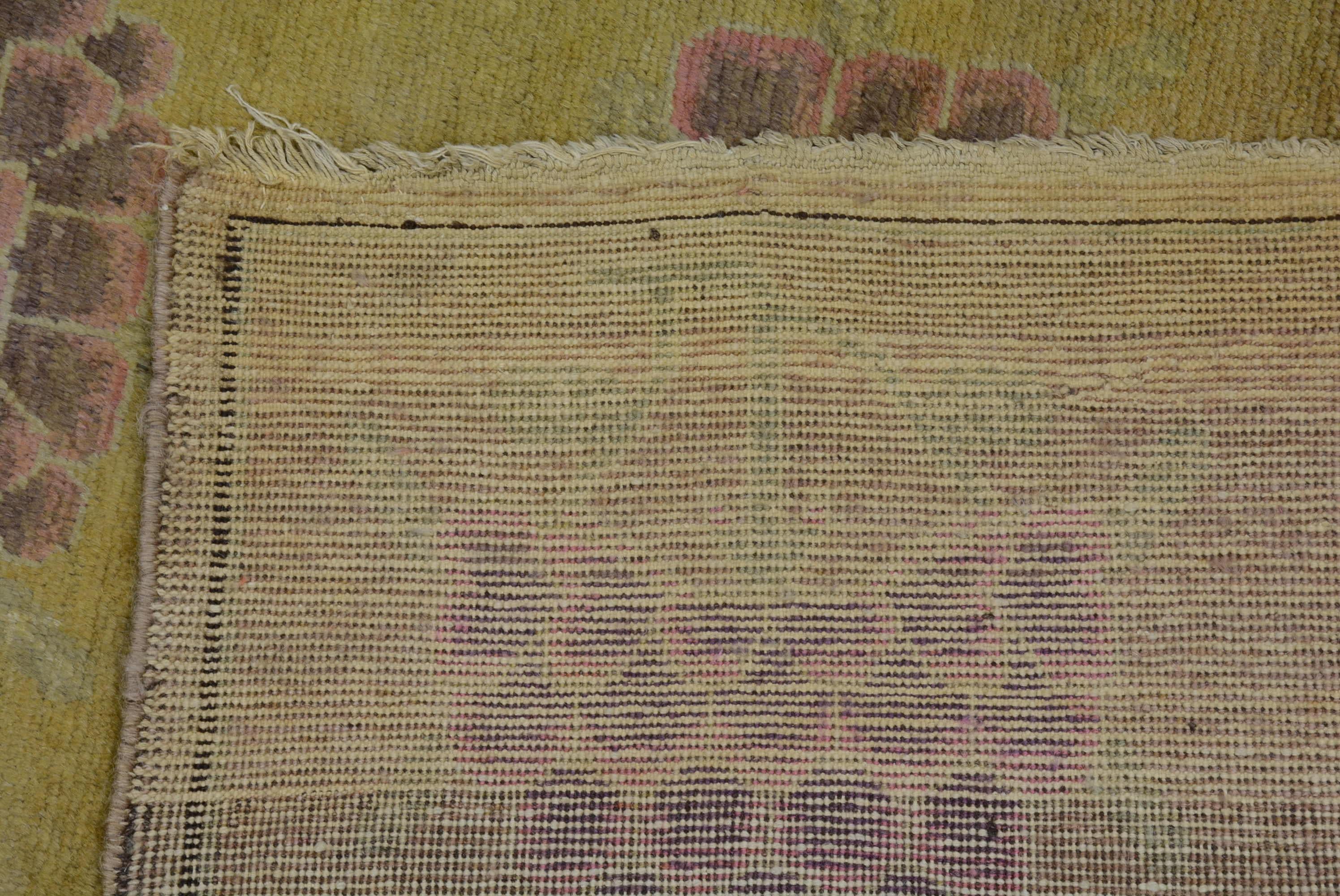 Antiker Khotan-Teppich mit Lotusblumenmuster (Wolle) im Angebot