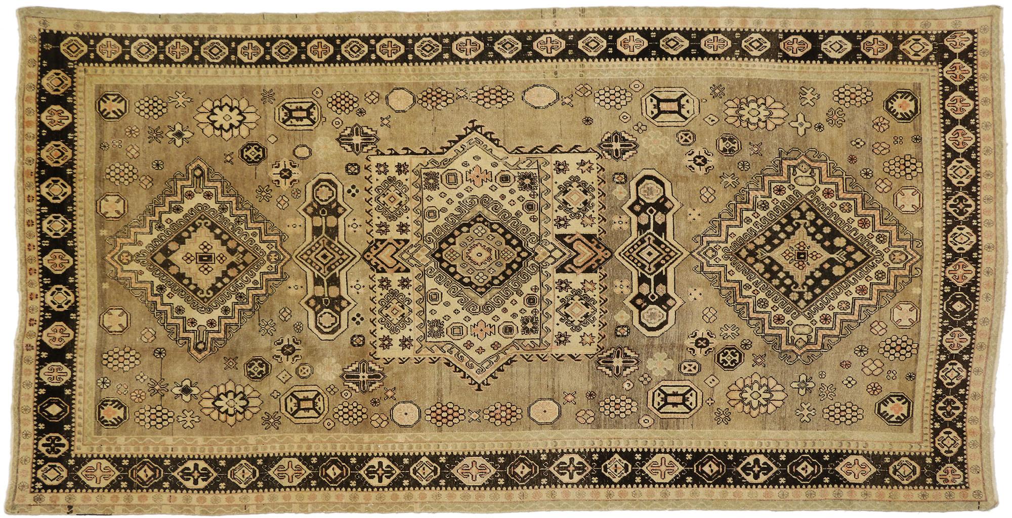 73806 Antique Khotan Pictorial Gallery Rug with Mid-Century Modern Tribal Style 06'09 x 13'02. Warm and inviting with nomadic vibes, this hand-knotted wool antique Pictorial gallery rug beautifully embodies a Mid-Century Modern Tribal style. The