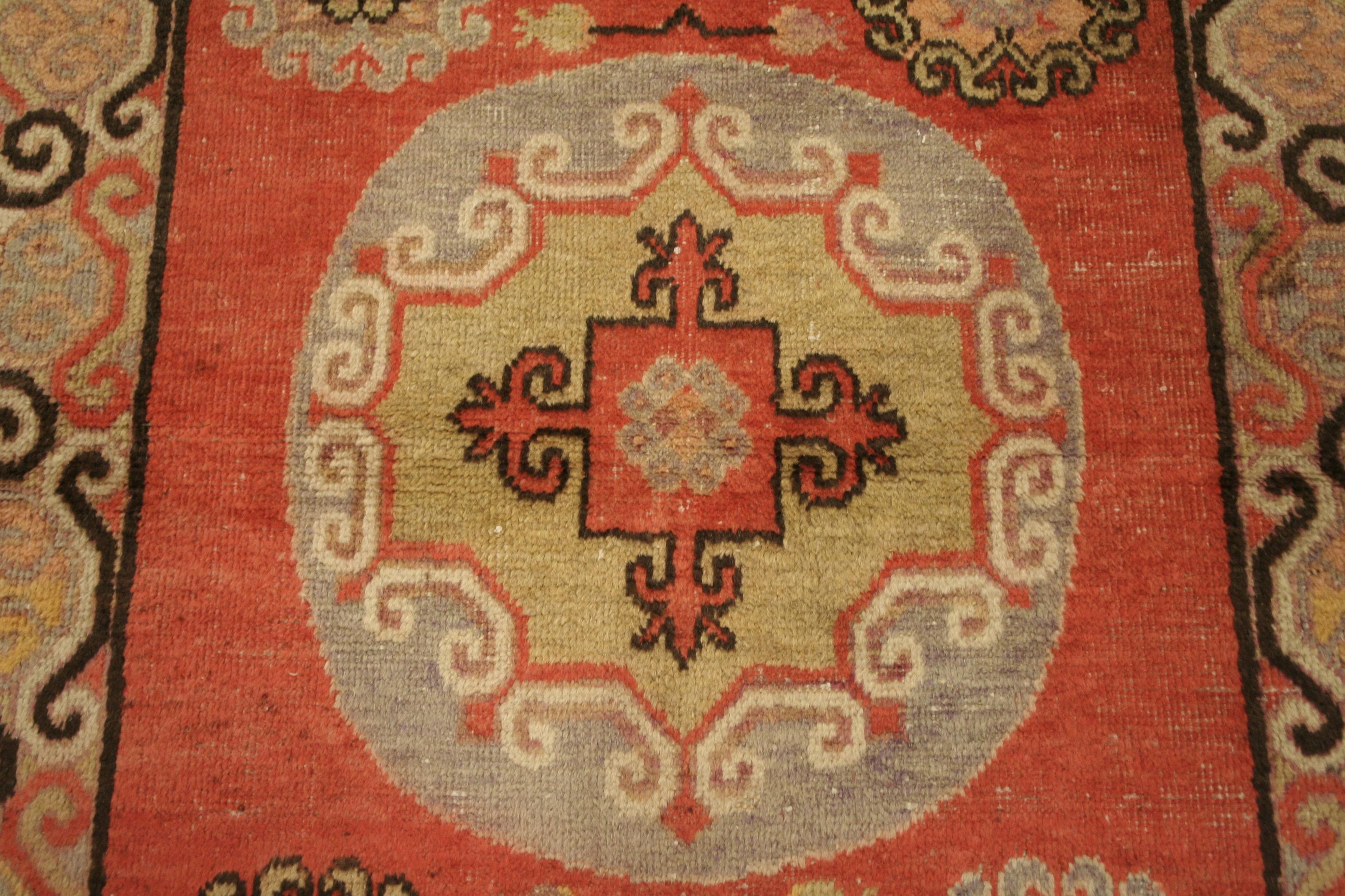 Hand-Knotted Antique Khotan Rug with Moon Shaped Roundels For Sale