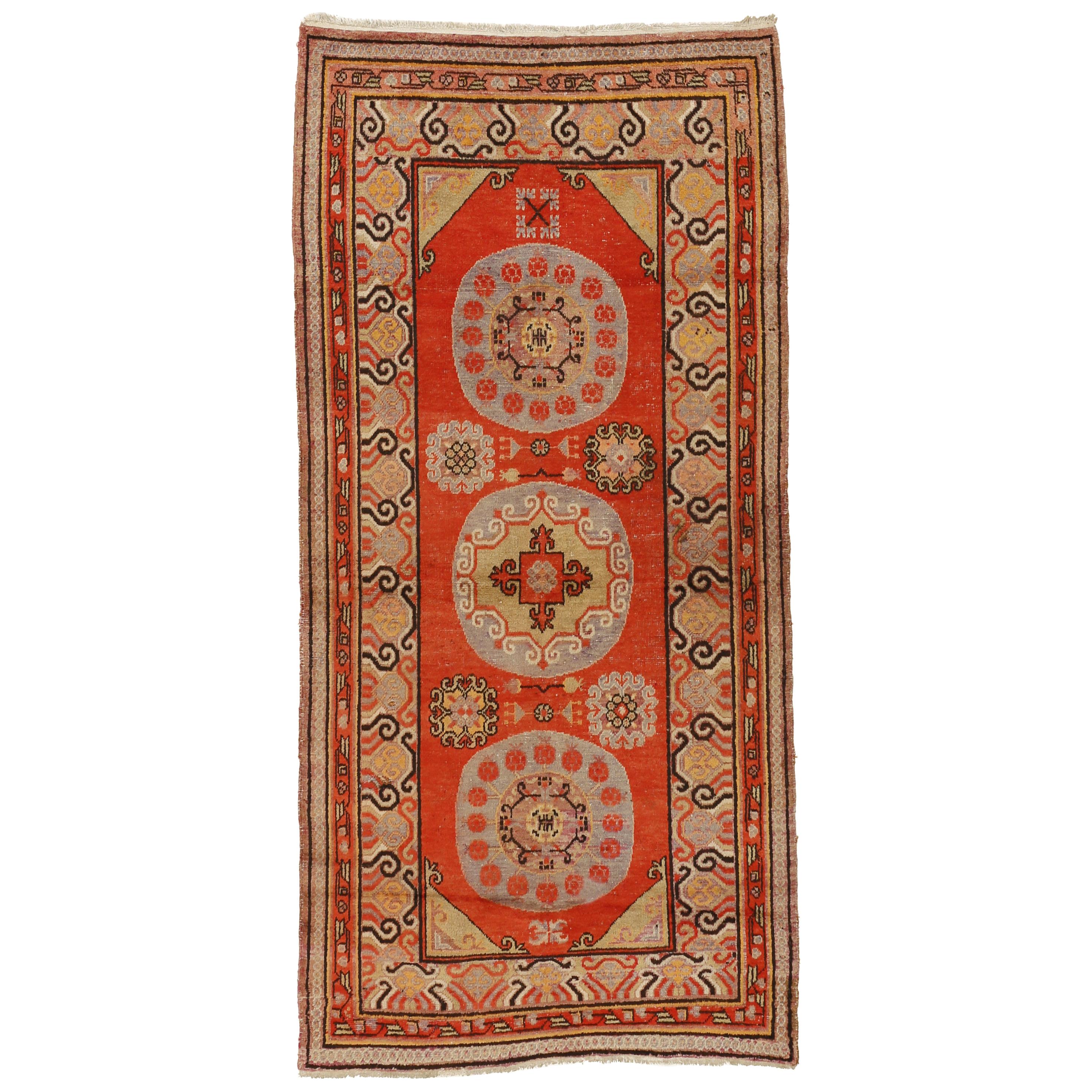 Antique Khotan Rug with Moon Shaped Roundels