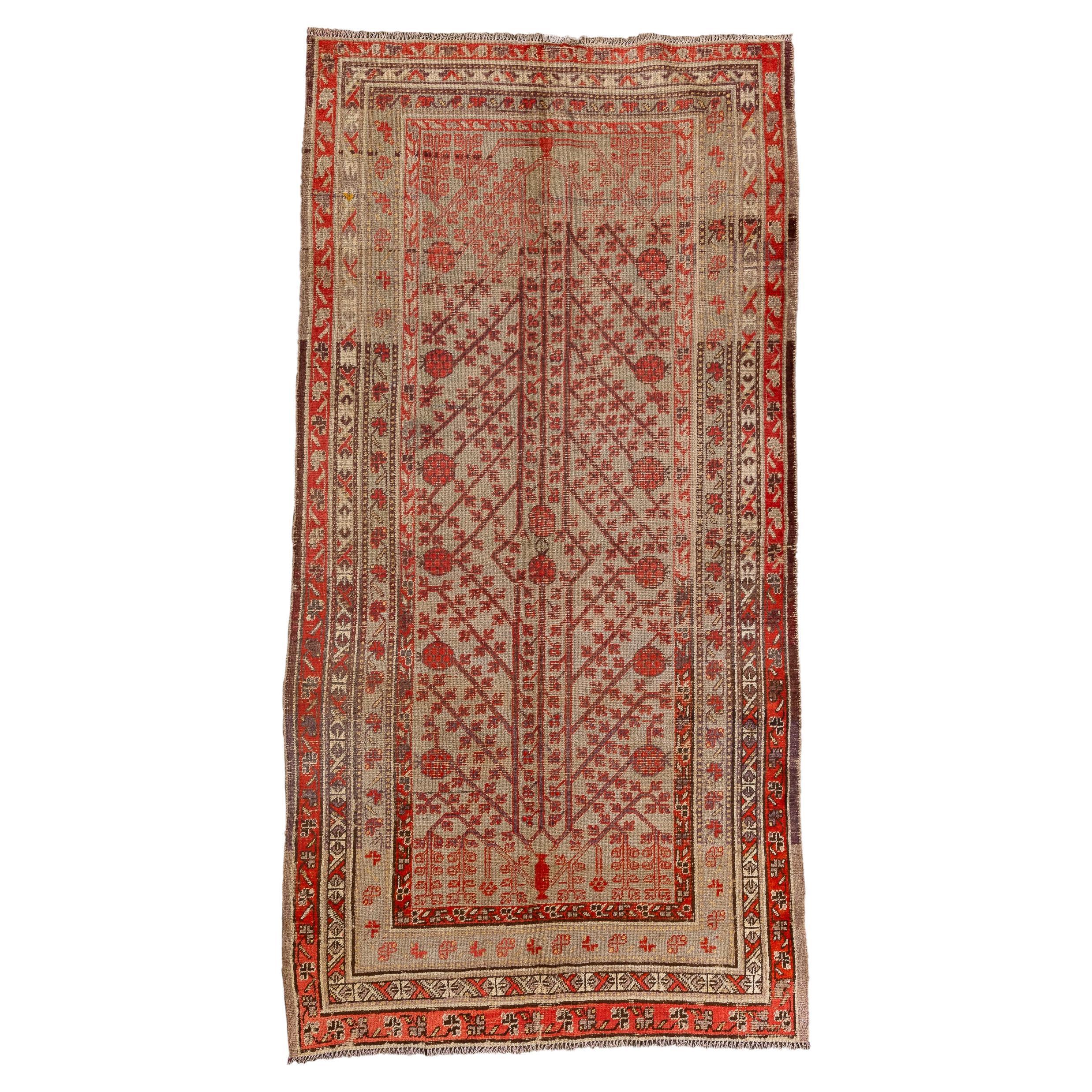 Antique Khotan Rug with Pomegranate Trees  For Sale
