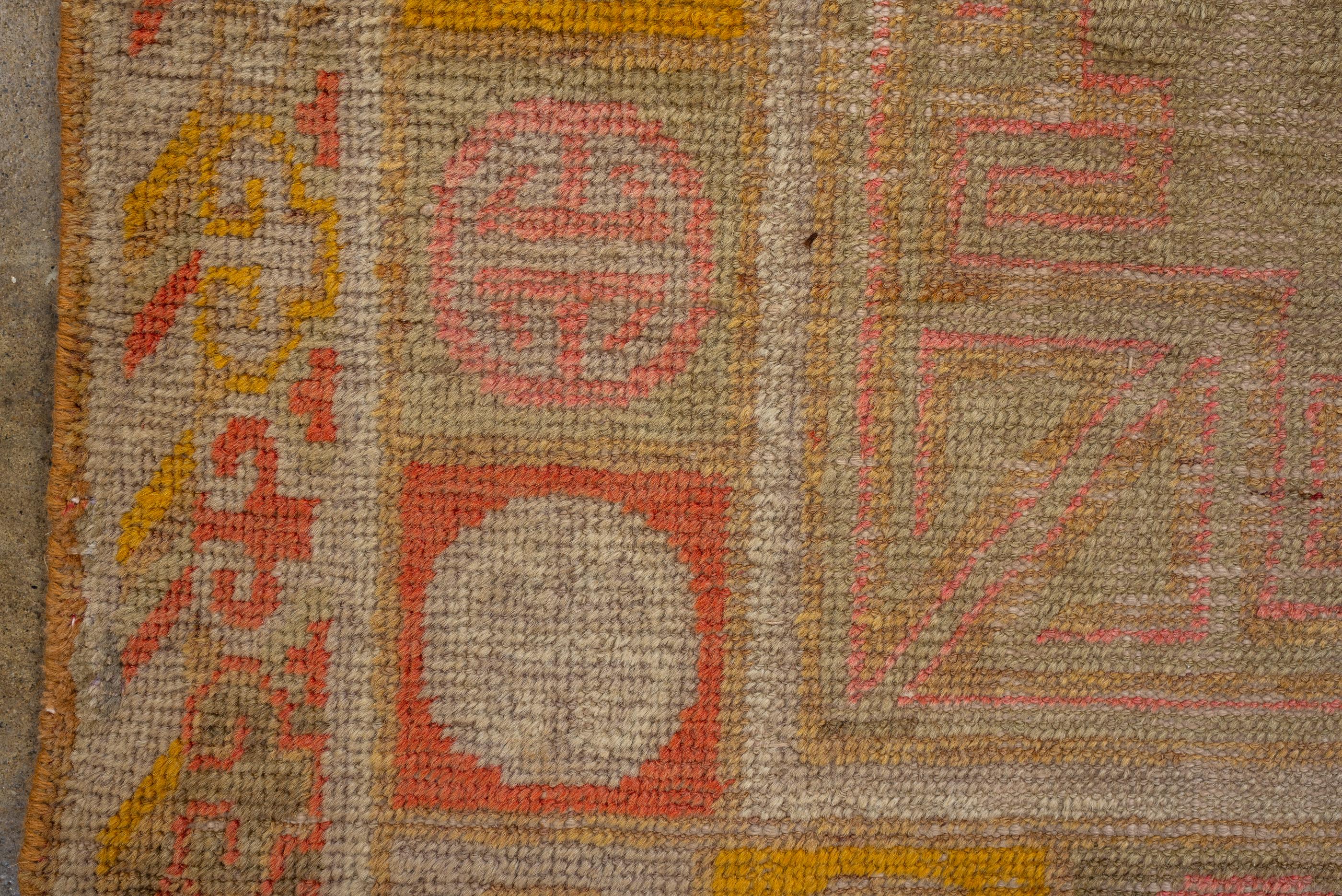 20th Century Antique Khotan Rug, with Straw Beige Field, and Moon Medallions For Sale