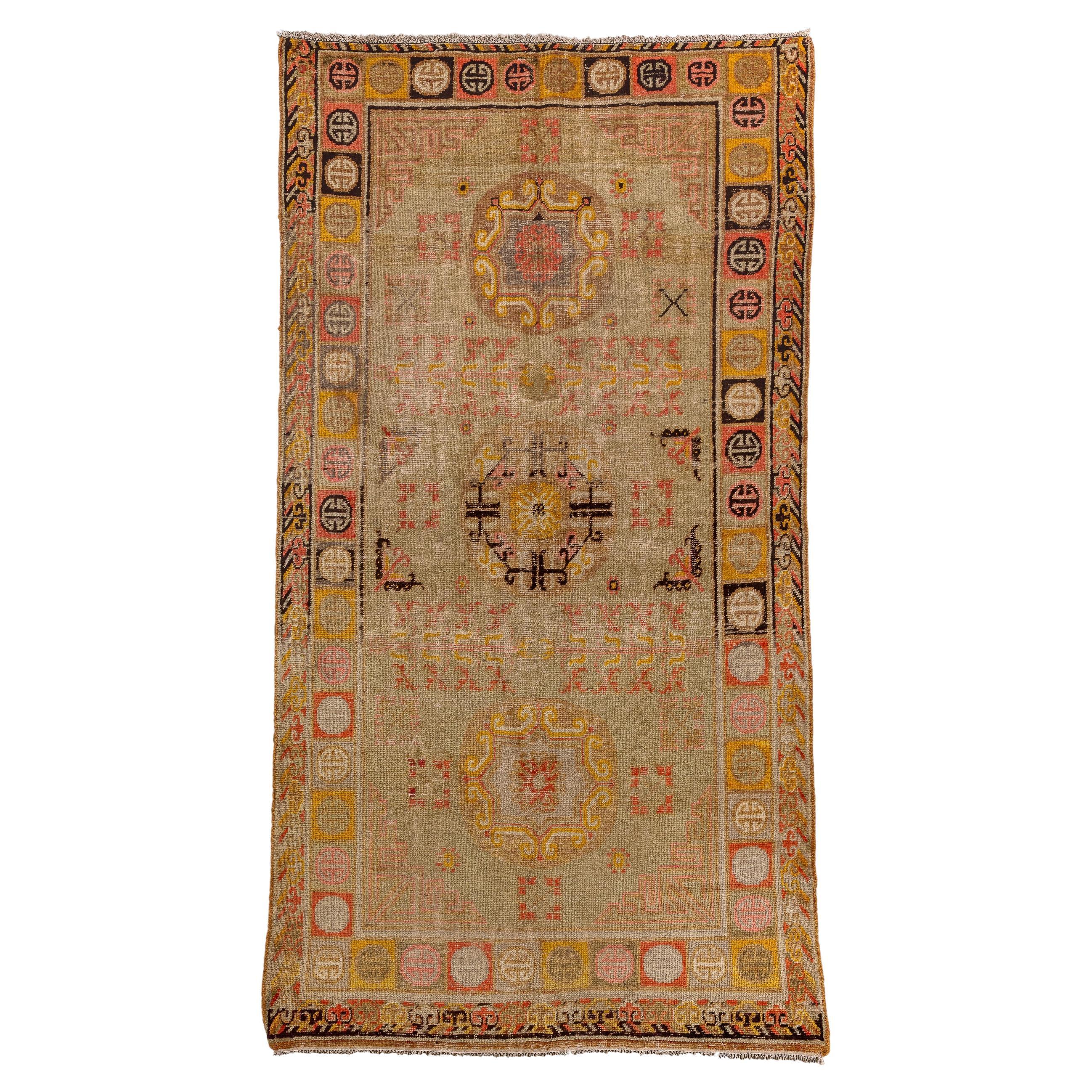 Antique Khotan Rug, with Straw Beige Field, and Moon Medallions For Sale