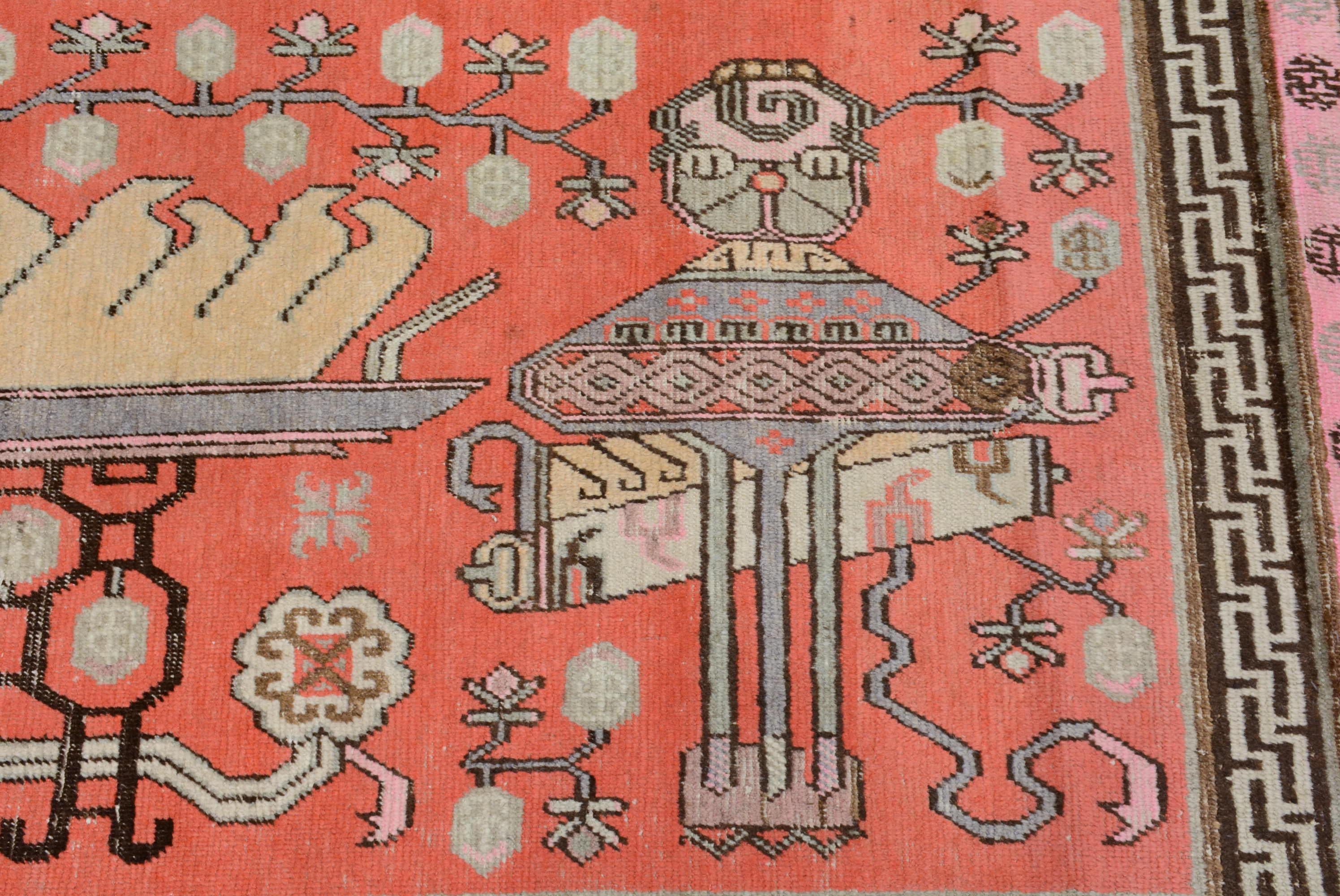 Woven Antique Khotan Rug with Vase Pattern For Sale