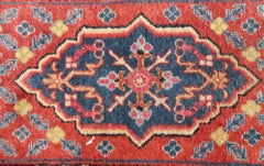 Antique Khotan Runner in Deep Indigo, Rust Red, and Soft Yellow Tones