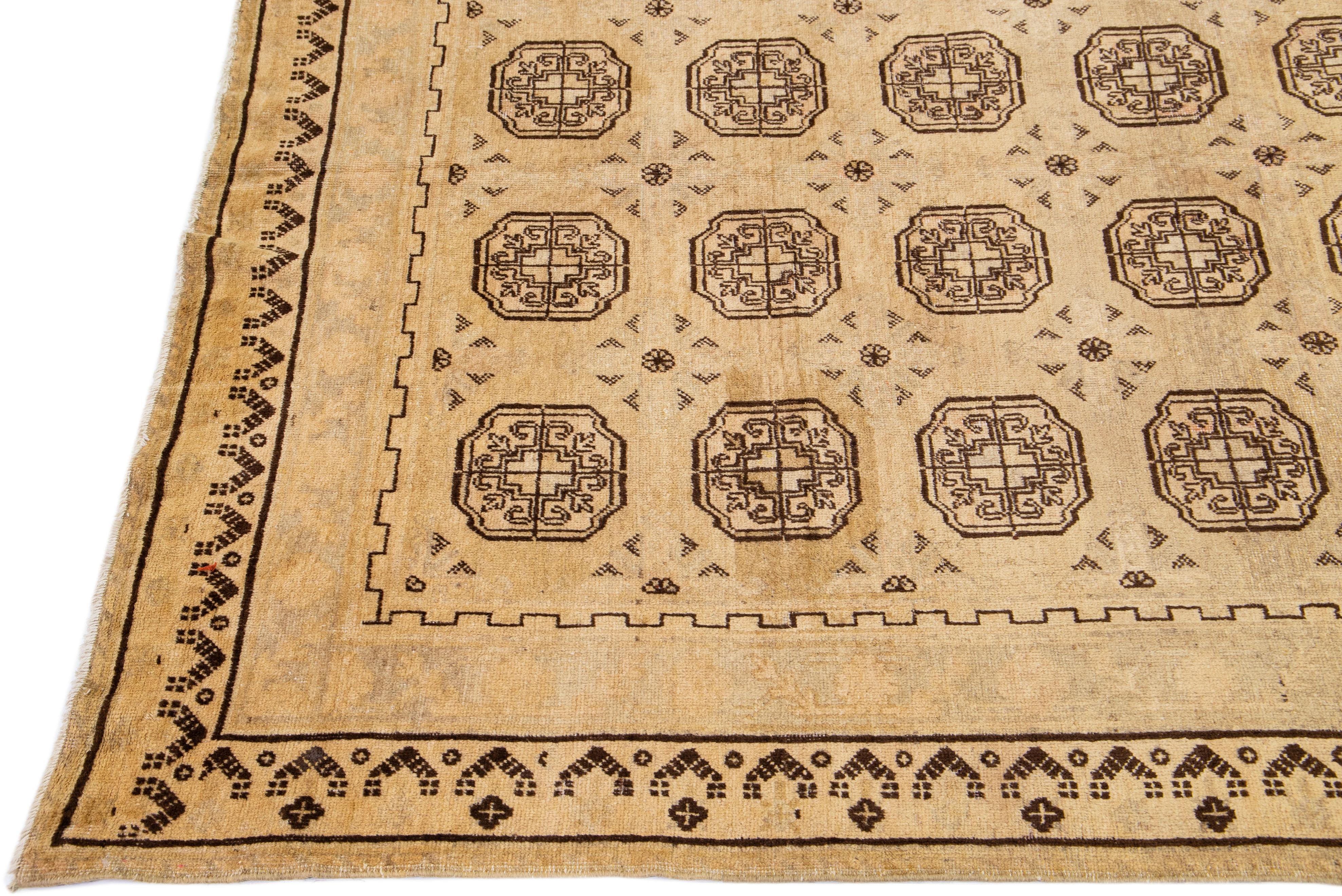 Hand-Knotted Antique Khotan Tan Handmade Geometric Pattern Wool Rug For Sale