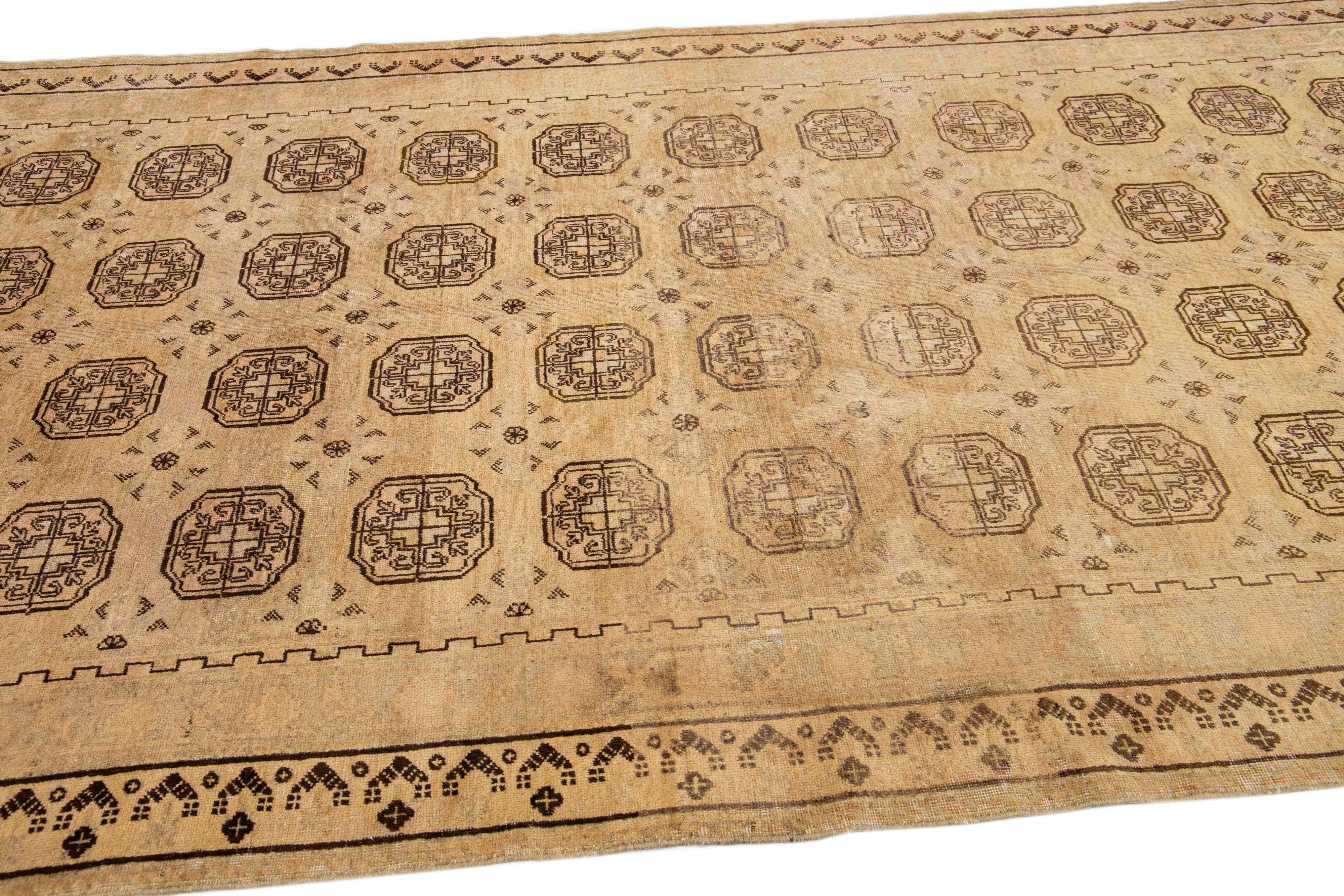 Antique Khotan Tan Handmade Geometric Pattern Wool Rug In Good Condition For Sale In Norwalk, CT