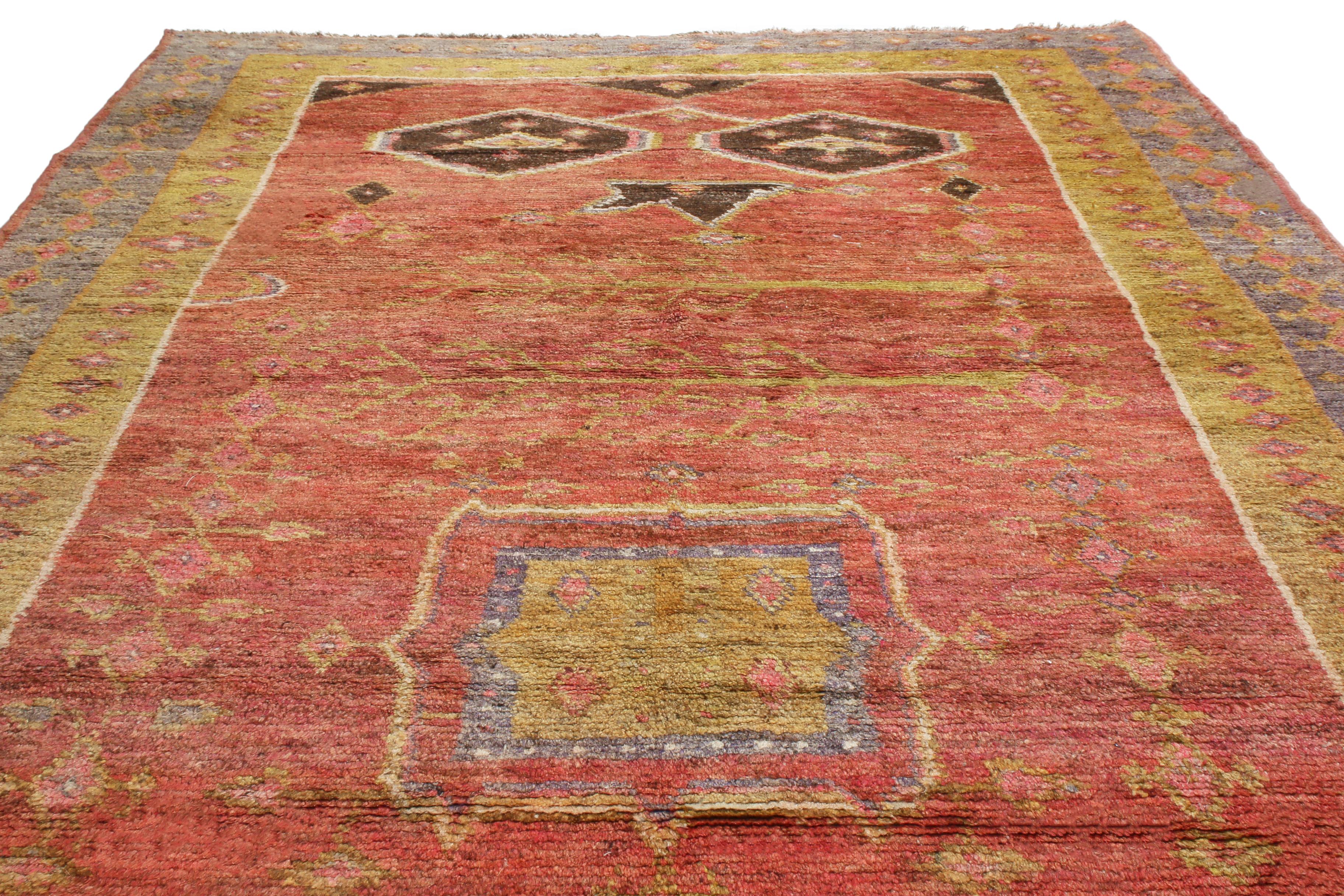Originating from East Turkestan between 1880-1900, this antique traditional Khotan wool rug stands apart from a great number of pieces from its era, typically favoring runners over these more spacious area pieces. Hand knotted in durable wool pile,
