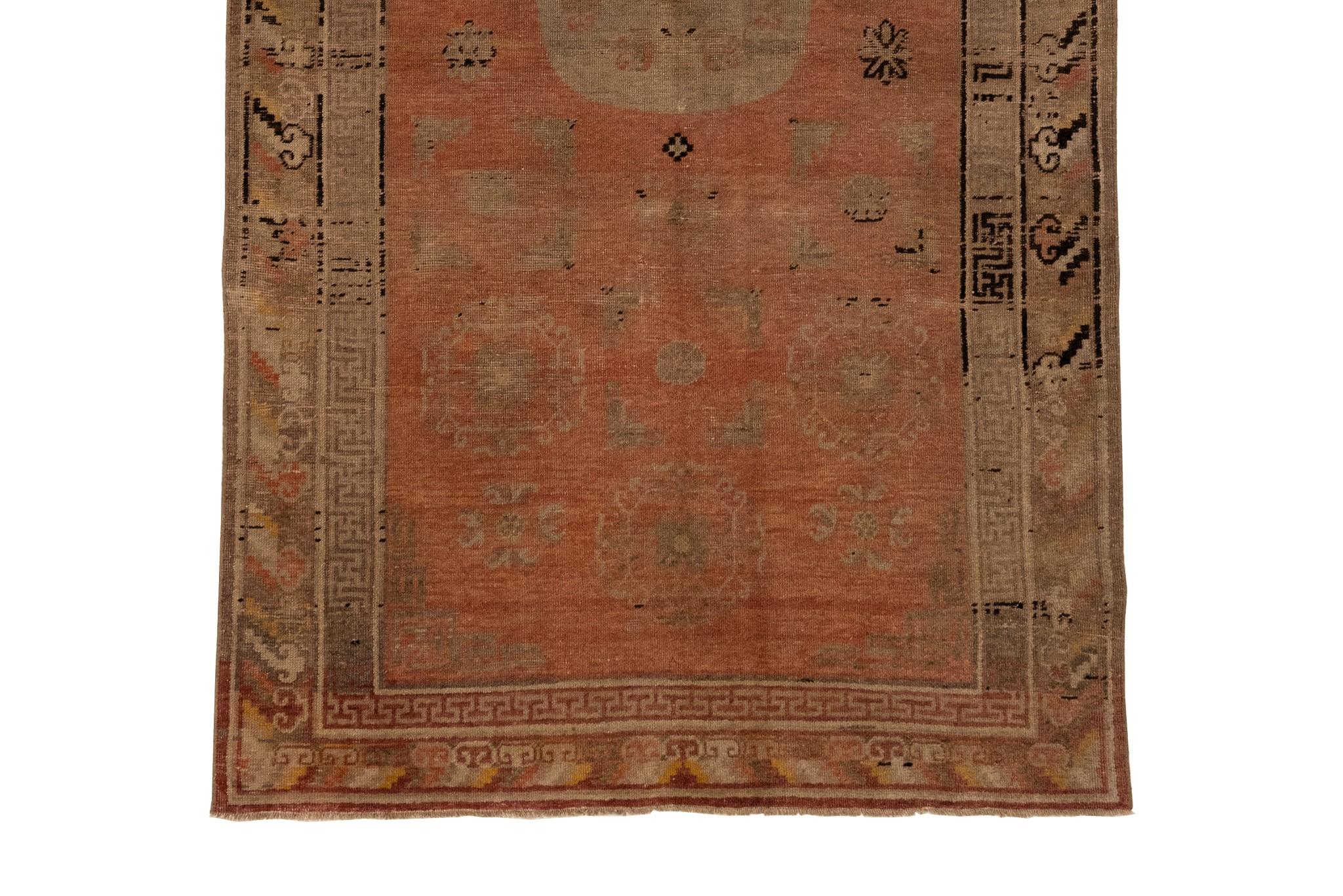 Hand-Knotted Antique Khotan with Stylized Central Medallion Rug For Sale