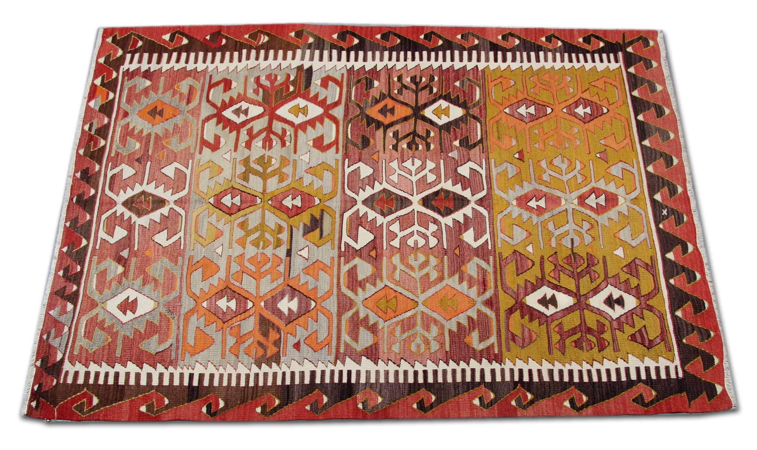 This antique rug is Turkish handmade carpet Oriental rug has woven by very skilled weavers in Turkey, who used the highest quality wool and cotton. The flat-weave rug has light red, orange, grey-green, white, gold, yellow and dark brown colors. The