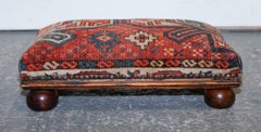 ANTIQUE KILIM TRIBAL RUG UPHOLSTERED FOOTSTOOL RAISED ON BUN FEET WiTH STUDS