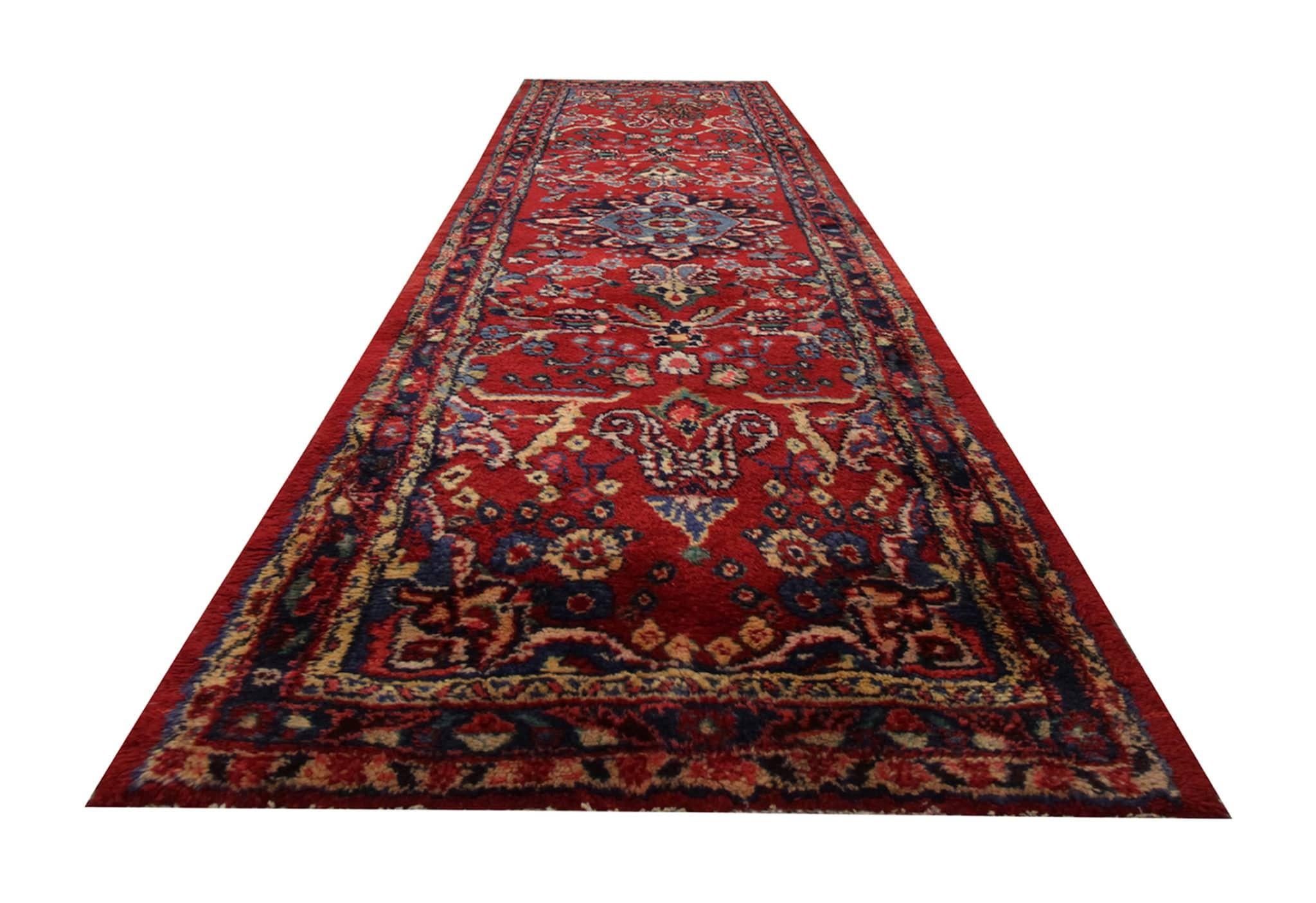Enhance the charm of your home with our vintage rust red runner rug, a timeless piece that adds character to any space. Crafted with meticulous care, this hand-knotted rug boasts exceptional quality and durability, making it a perfect choice for