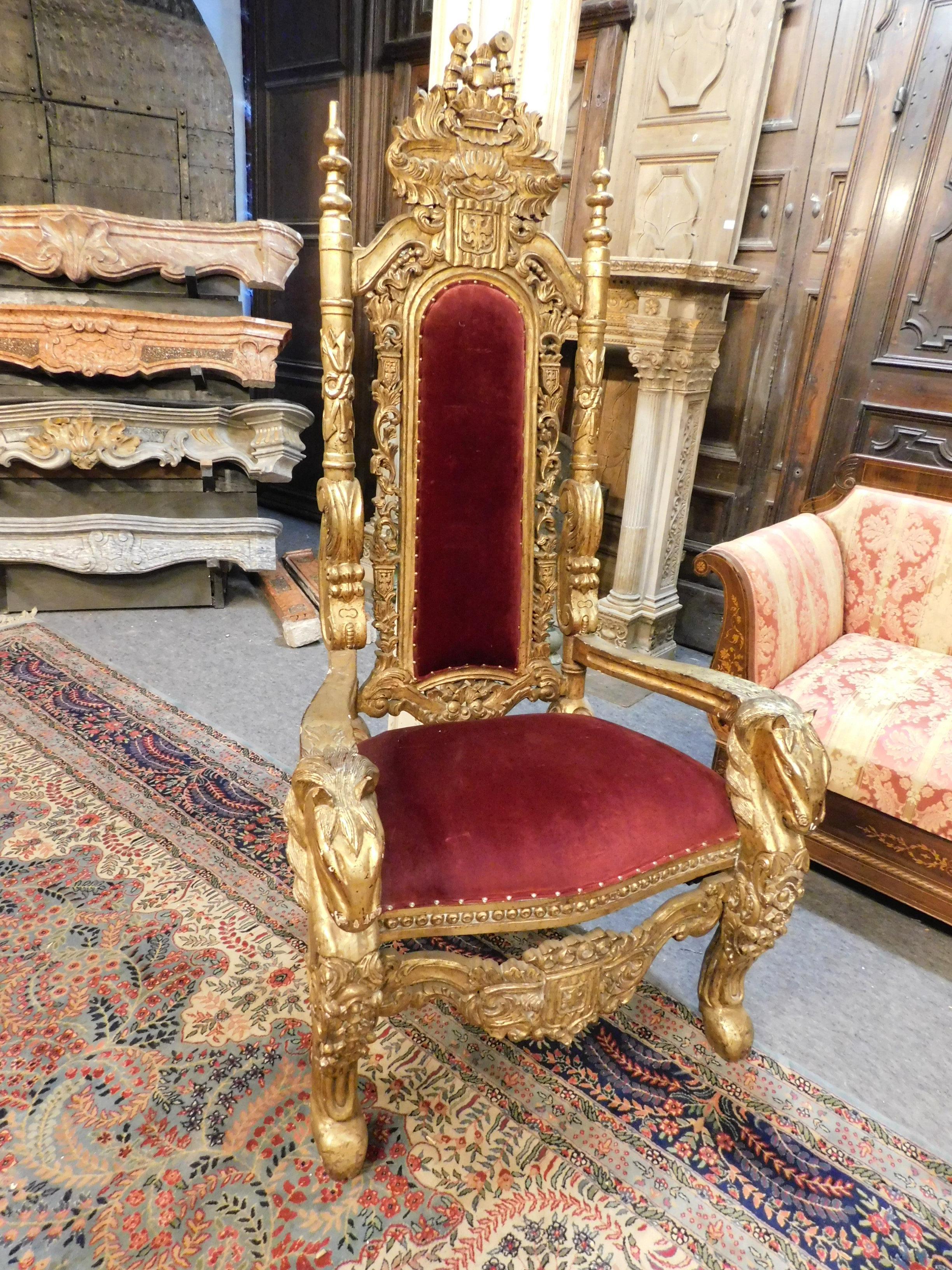 Antique King throne, very sculpted with symbols of power, gilded with perfect red fabric, replica of the 1800 in perfect condition, design of 1500, perfect to feel king of the house!