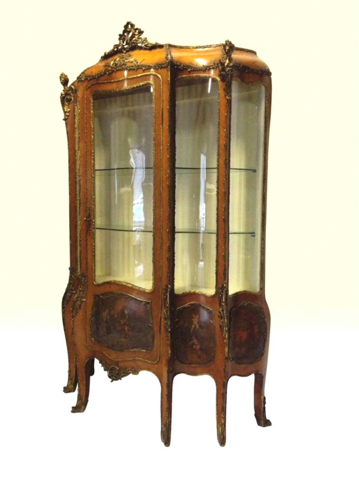 A stunning antique Kingwood French Bombe Vernis Martin display cabinet vitrine 
in the Louis XV manner, Circa 1880 
There are five beautiful panels which have been hand painted with cubits and romantic figures in 18th century costume in a garden