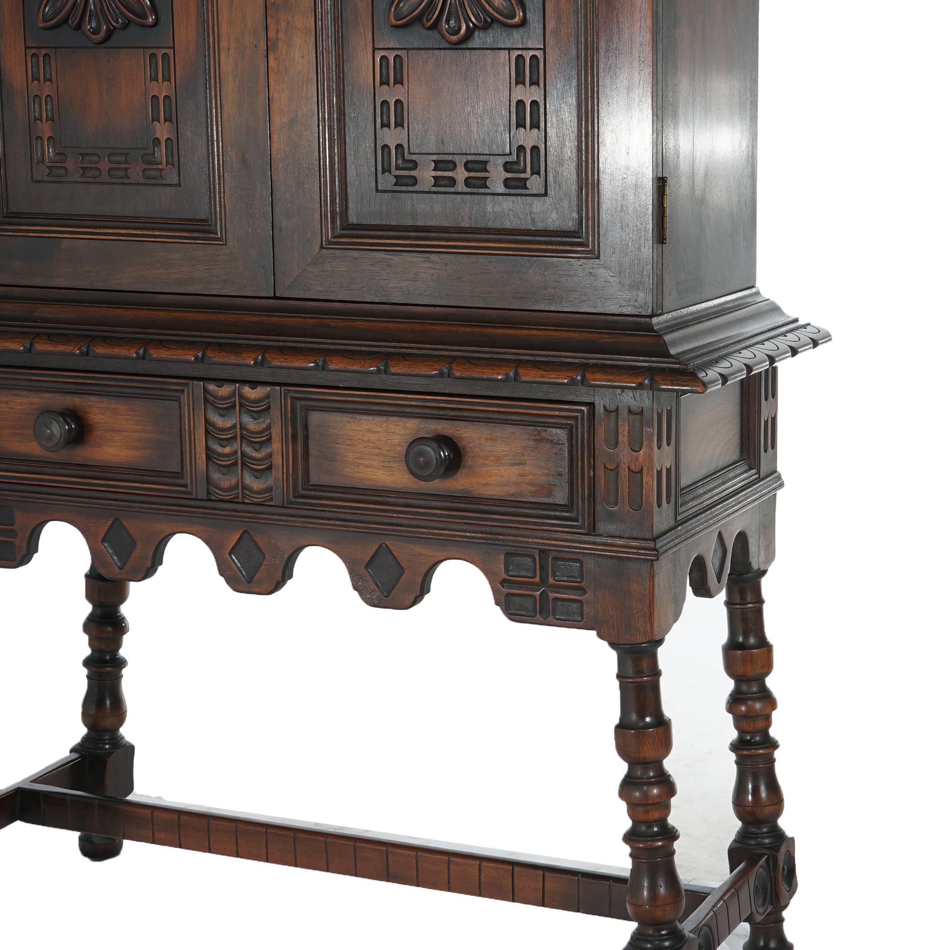 ***Inquire About Reduced In-House Delivery Rates - Reliable Professional Service & Fully Insured***

Antique Kittinger Jacobean Style Floral Carved Walnut Credenza with Double Door Cabinet over Base with Single Long Drawers and Turned Legs