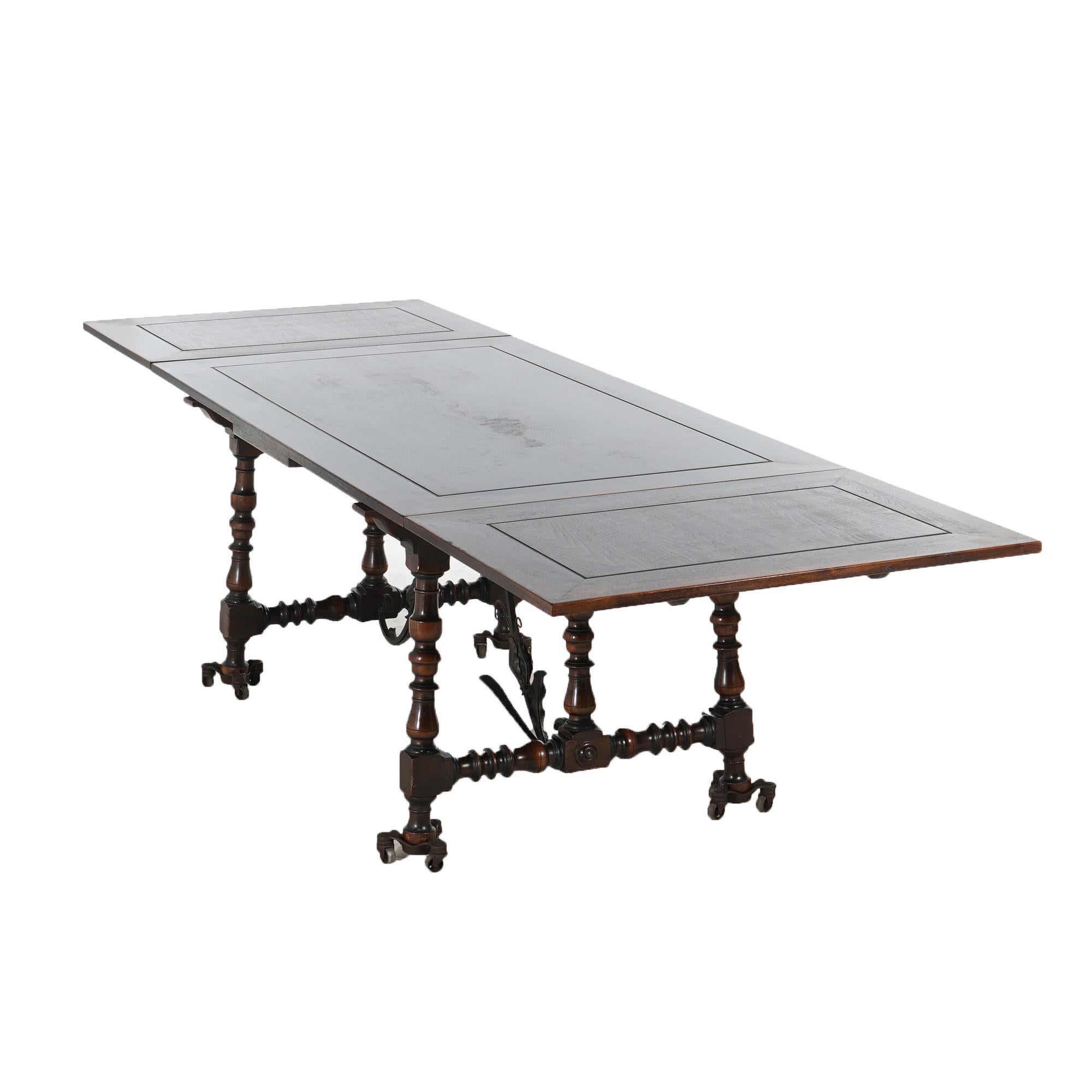 ***Inquire About Reduced In-House Delivery Rates - Reliable Professional Service & Fully Insured***
Antique Kittinger Jacobean Style Walnut & Foliate Form Wrought Iron Draw Top Dining Table Raised on Turned Legs c1930

Measures - 30.25