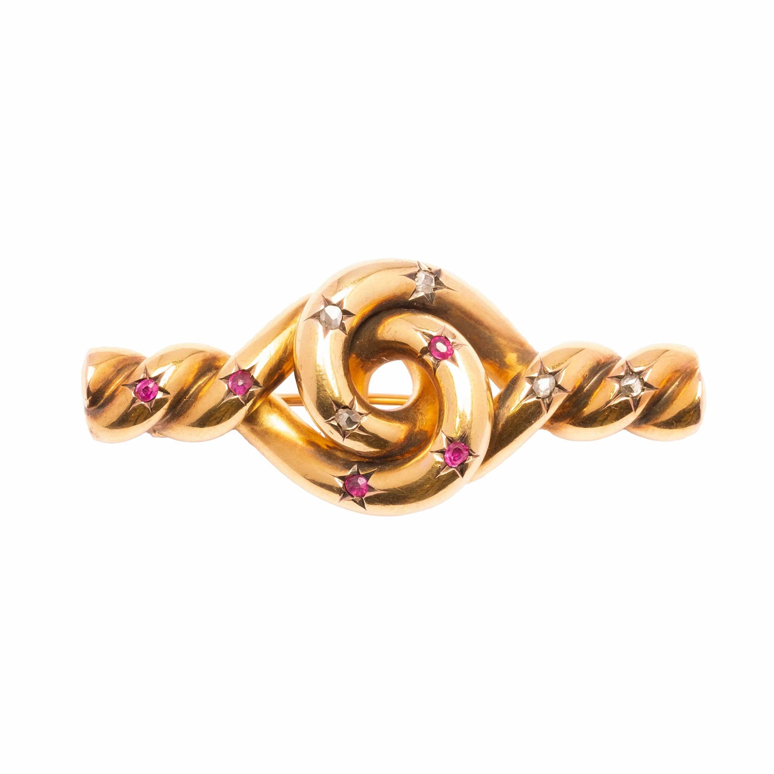 Antique Knot brooch with rubies and diamonds For Sale