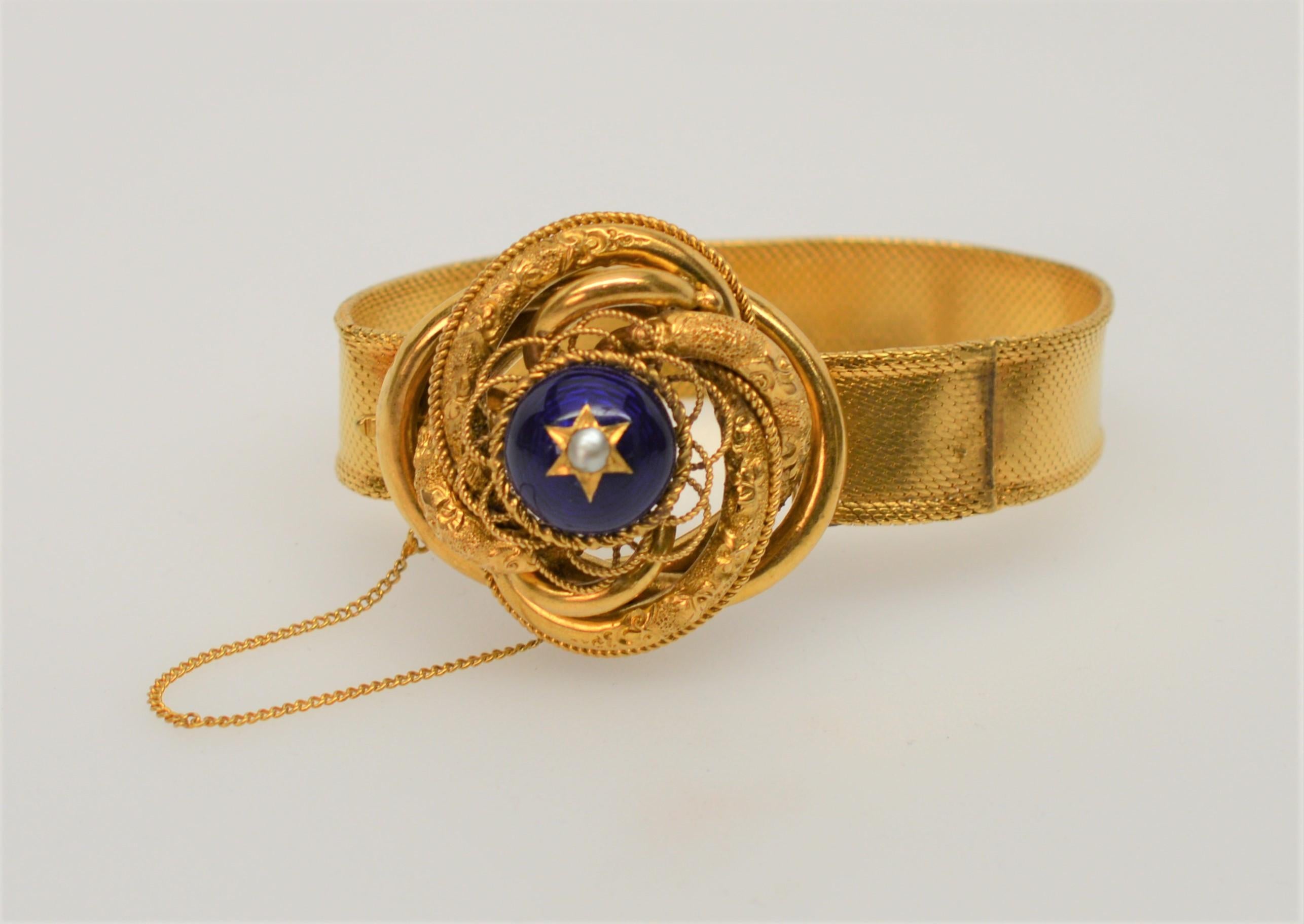 Antique Knotted Yellow Gold Blue Enamel and Pearl Charm Bracelet In Good Condition In Mount Kisco, NY